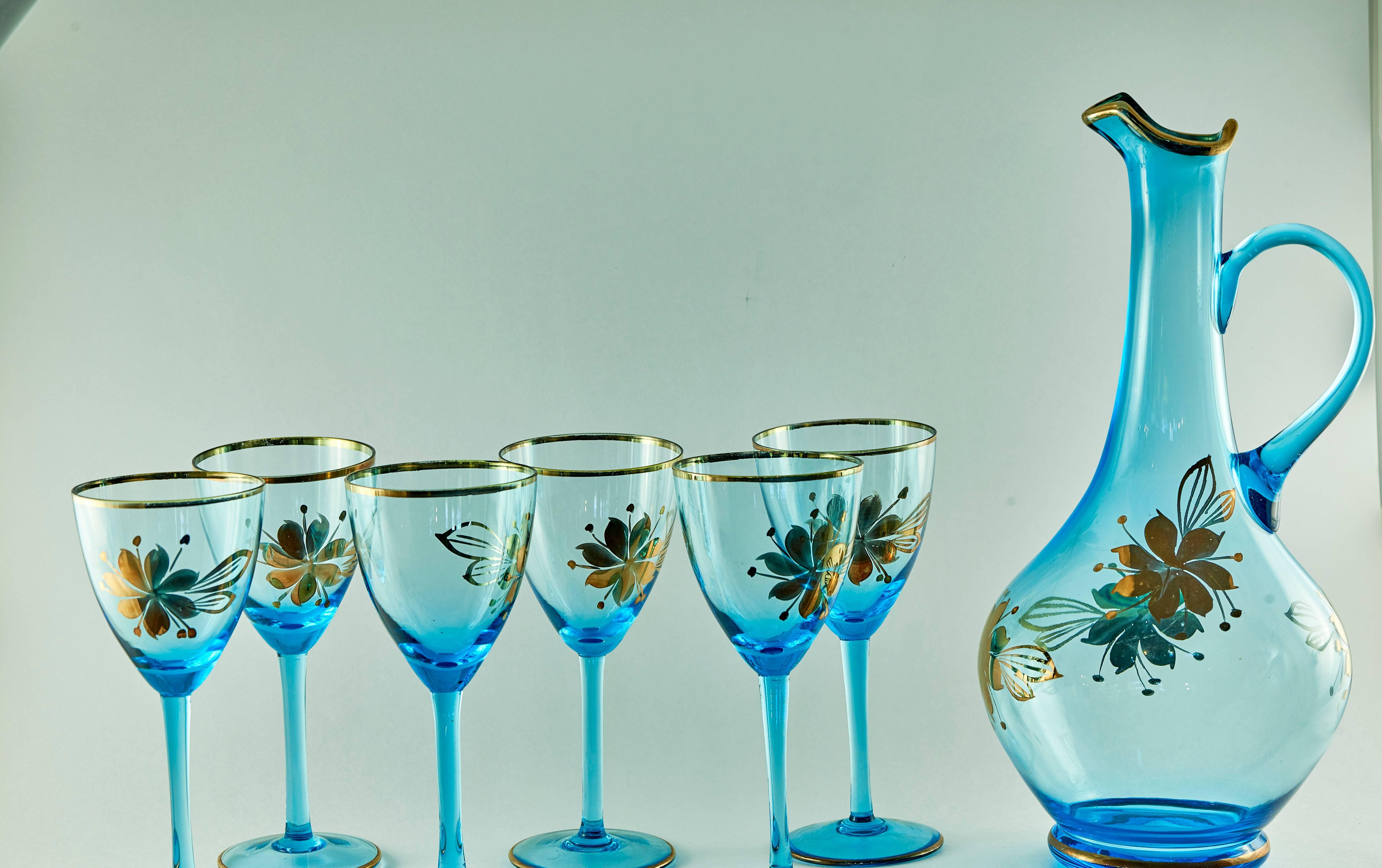 Stunning for the Holidays Greek Blue Import Mediterranean Decanter Glassware. This Beyond Beautiful Greece Import Mediterranean Sea Blue and Gilt Gold Floral Designs Hollywood Regency Decanter with Six Fabulous Glasses.  Remarkably Beautiful and