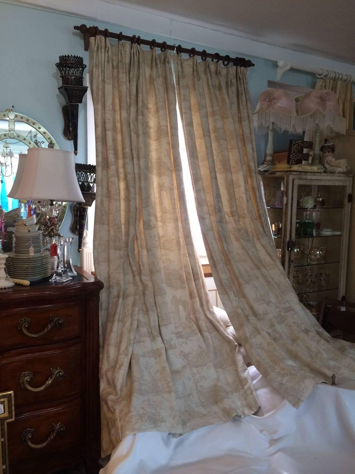 In the style of Jean-Baptiste Huet off white and taupe French toile de Jouy Draperies. Elegant beauty. Every design tells a story. Beautifully lined cotton.

The beautiful rods are sold separately.

                    