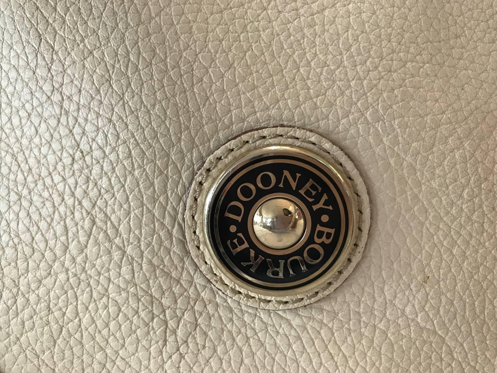 Contemporary Authentic Creme Colored Dooney Bourke Leather Hand Bag, Clean, Rarely Used For Sale