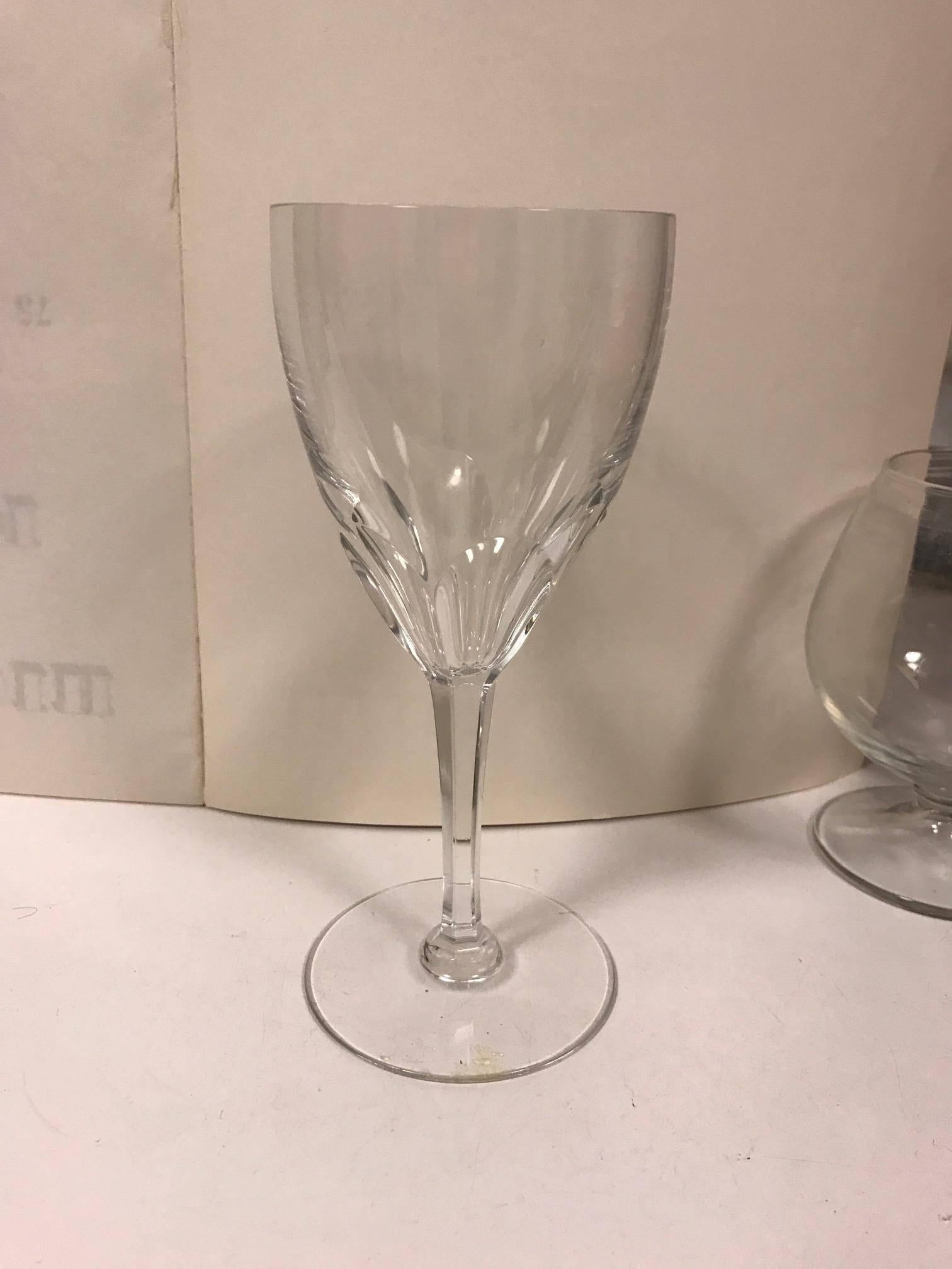 Holiday Bling! Rare Discontinued Set of 16 Baccarat Genova Wine Crystal Glasses/ Goblet's  Never Used!!  

Set of 16 Beautiful Baccarat Genovo  Wine Goblet's Never Used. Glasses!  Excellent Condition.  

Thumbprint Cut Bowl, Six Sided Stem
Pattern: