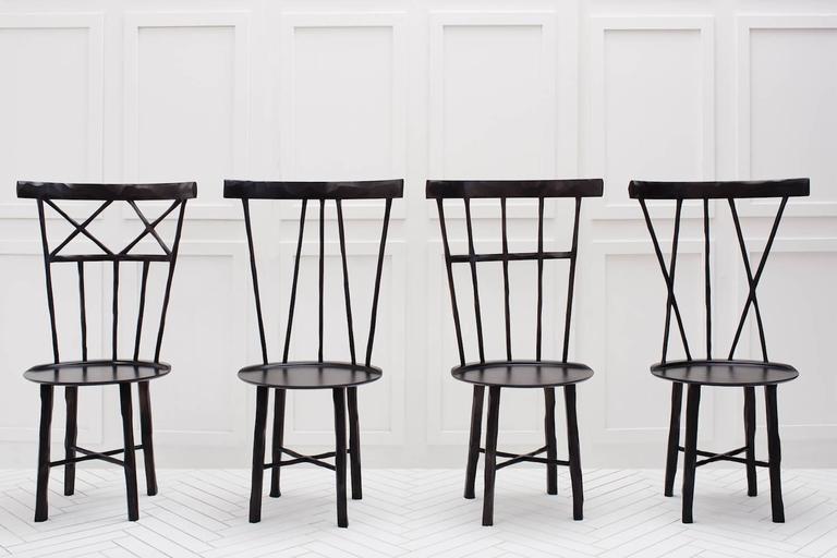 A modern interpretation of the classic Windsor chair. Made from hard maple, each spoke and leg is meticulously hand-carved with soft organic contours. 

Please note lead times for customized orders may vary. Details upon request. Rush orders can
