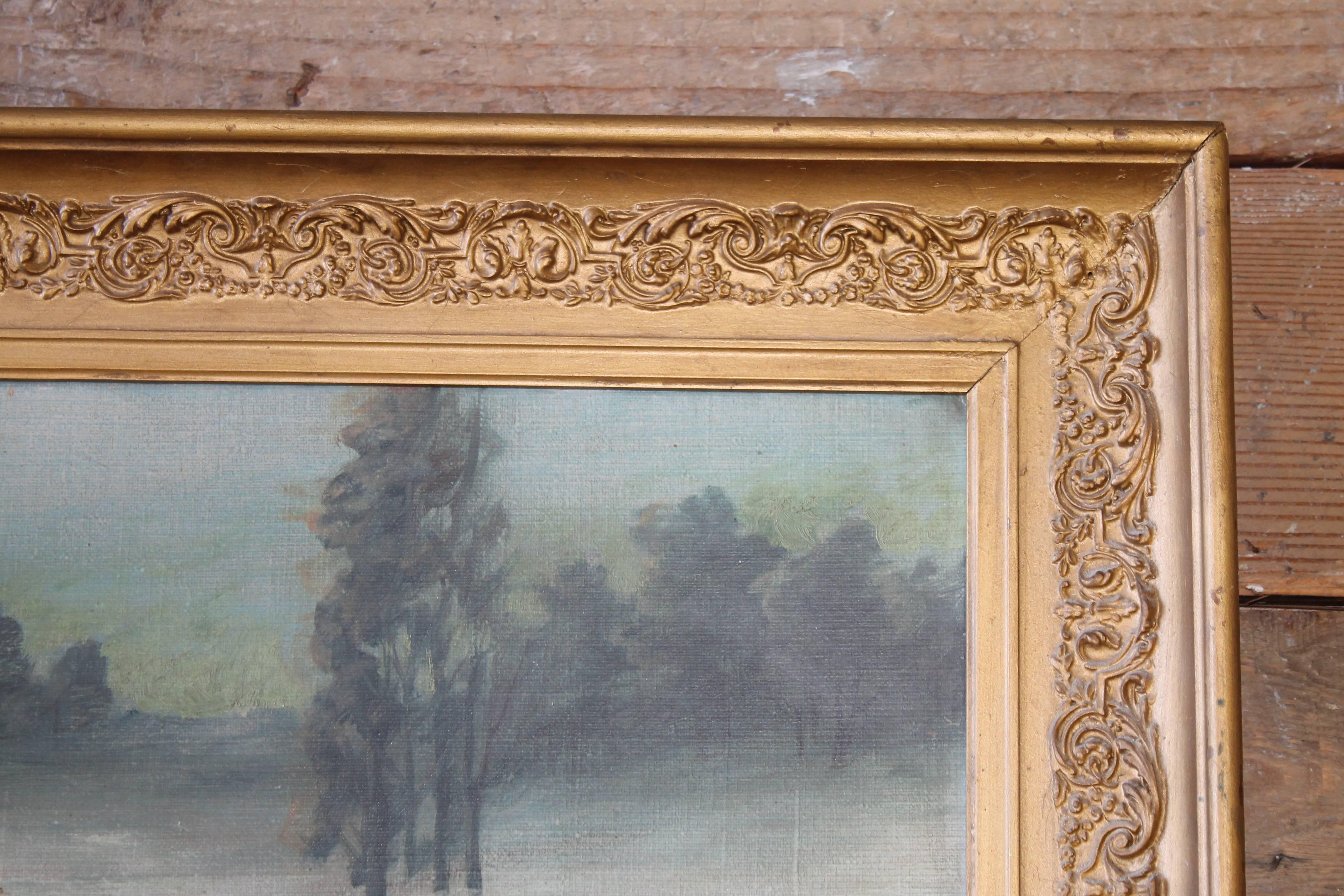Carved Early 20th Century Antique River Landscape Oil on Canvas in Giltwood Frame For Sale
