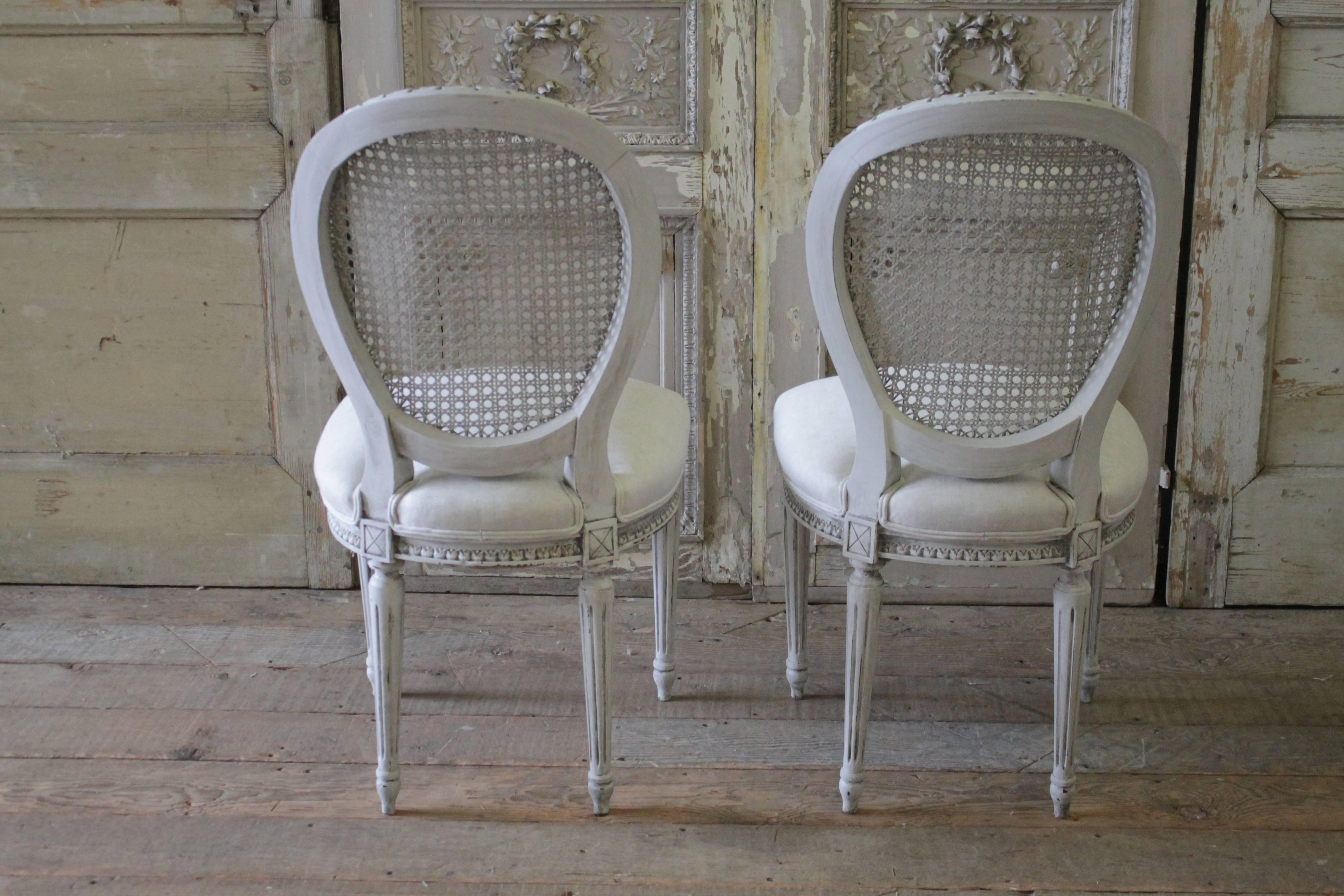 20th Century Pair of Antique French Louis XVI Style Cane Back Side Chairs