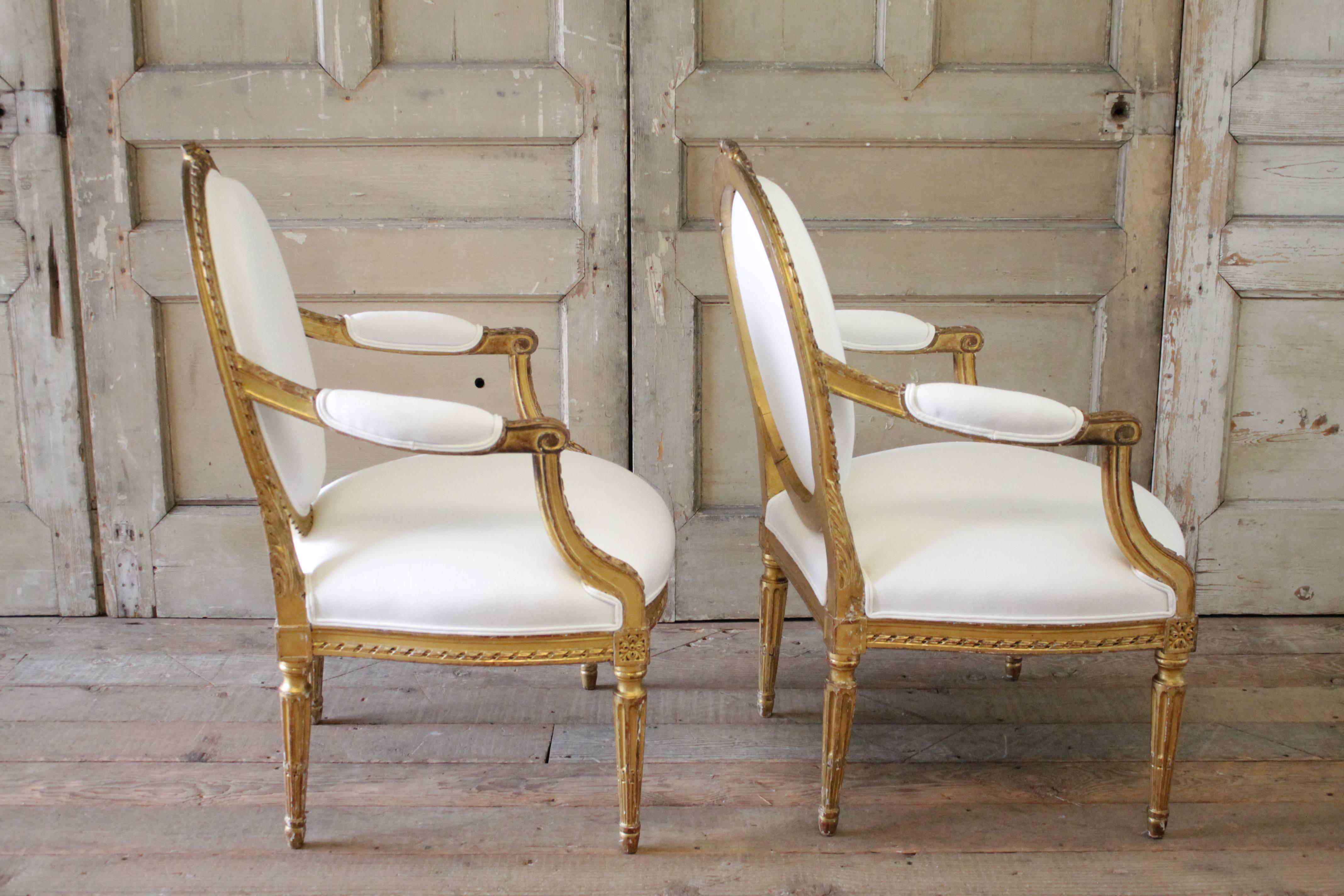 20th Century Carved Giltwood Louis XVI Style Open Armchairs 2