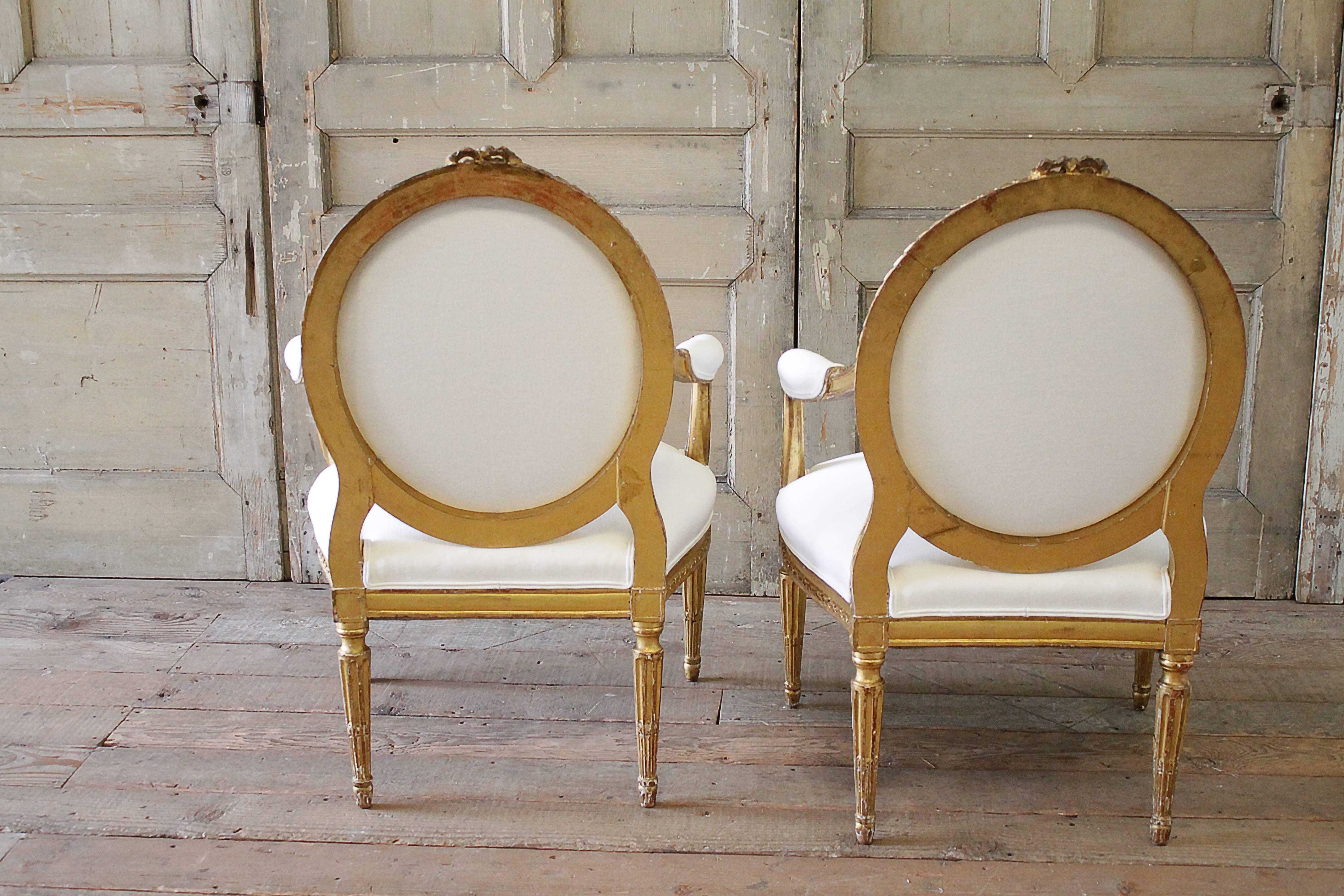 20th Century Carved Giltwood Louis XVI Style Open Armchairs 4