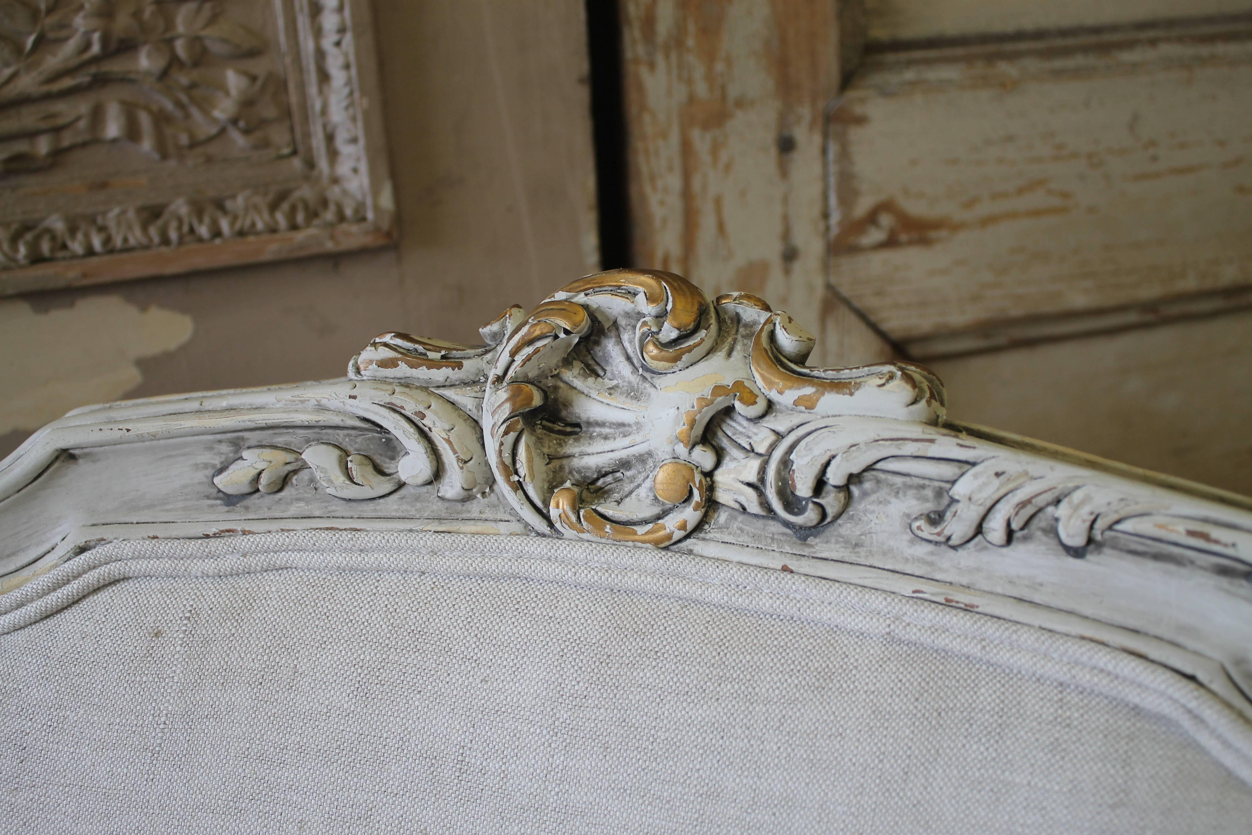 A beautiful French chair with matching ottoman we have painted in a soft oyster white, with subtle distressed edges, and finished with an antique glazed patina. The end result is a soft subtle pale grey tone that blends with everything. We