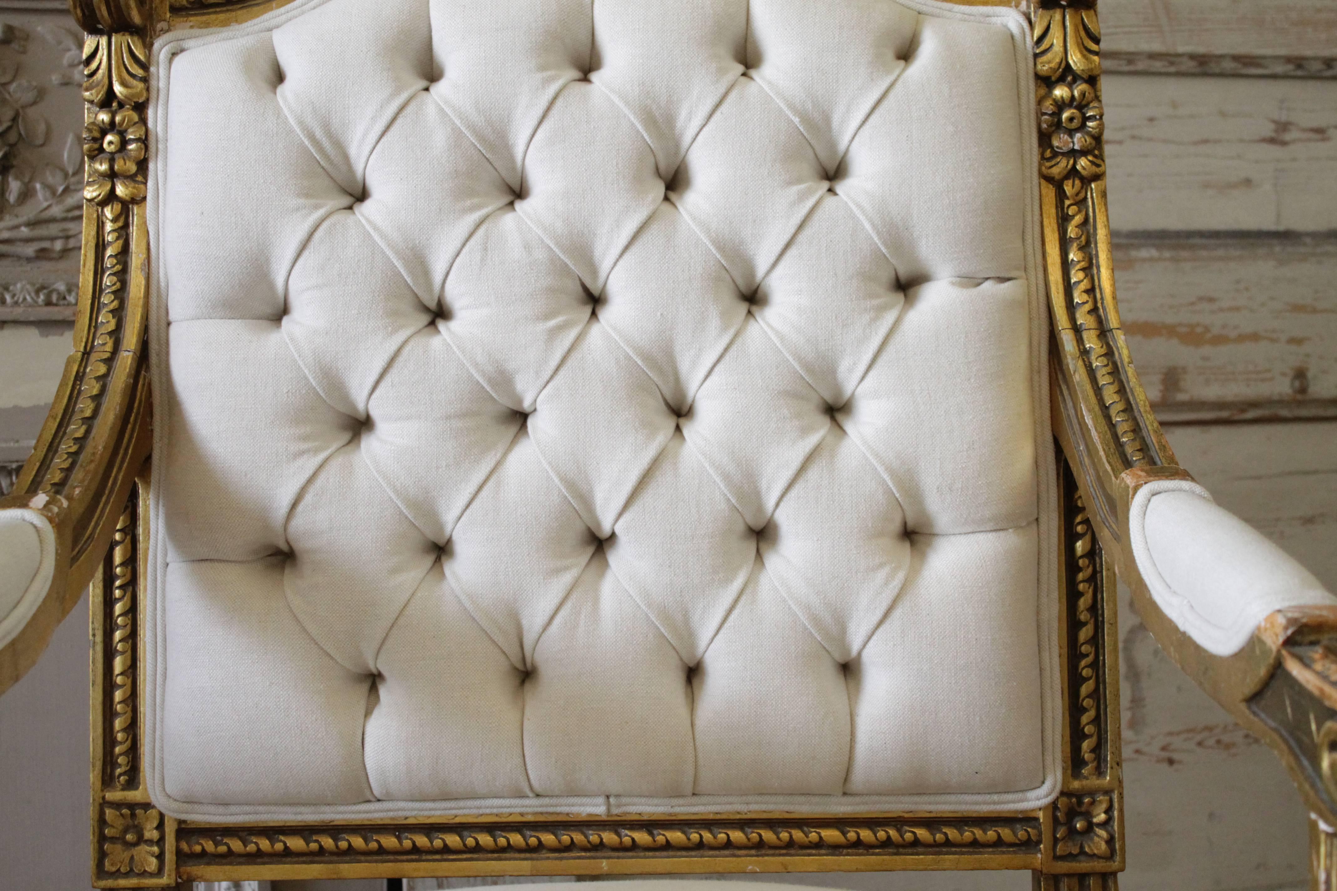 French Pair of 19th Century Giltwood Linen Tufted Open Armchairs