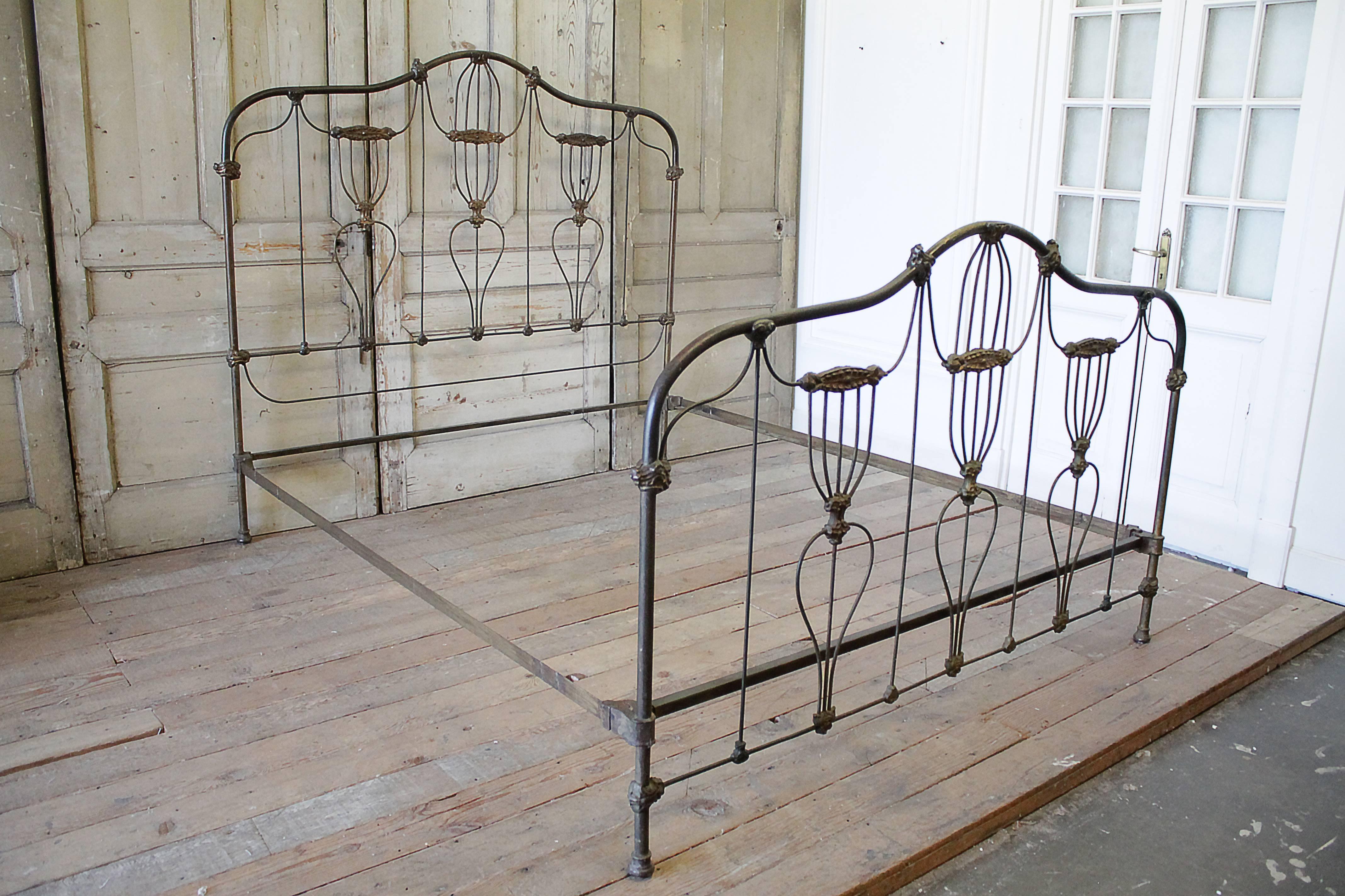 Lovely antique bed has been stretched to a king-size. The rails have been lengthened and this bed accommodates a California King, as well as an eastern King. We will have custom wood slats made to send with this bed to hold the platforms.
The color