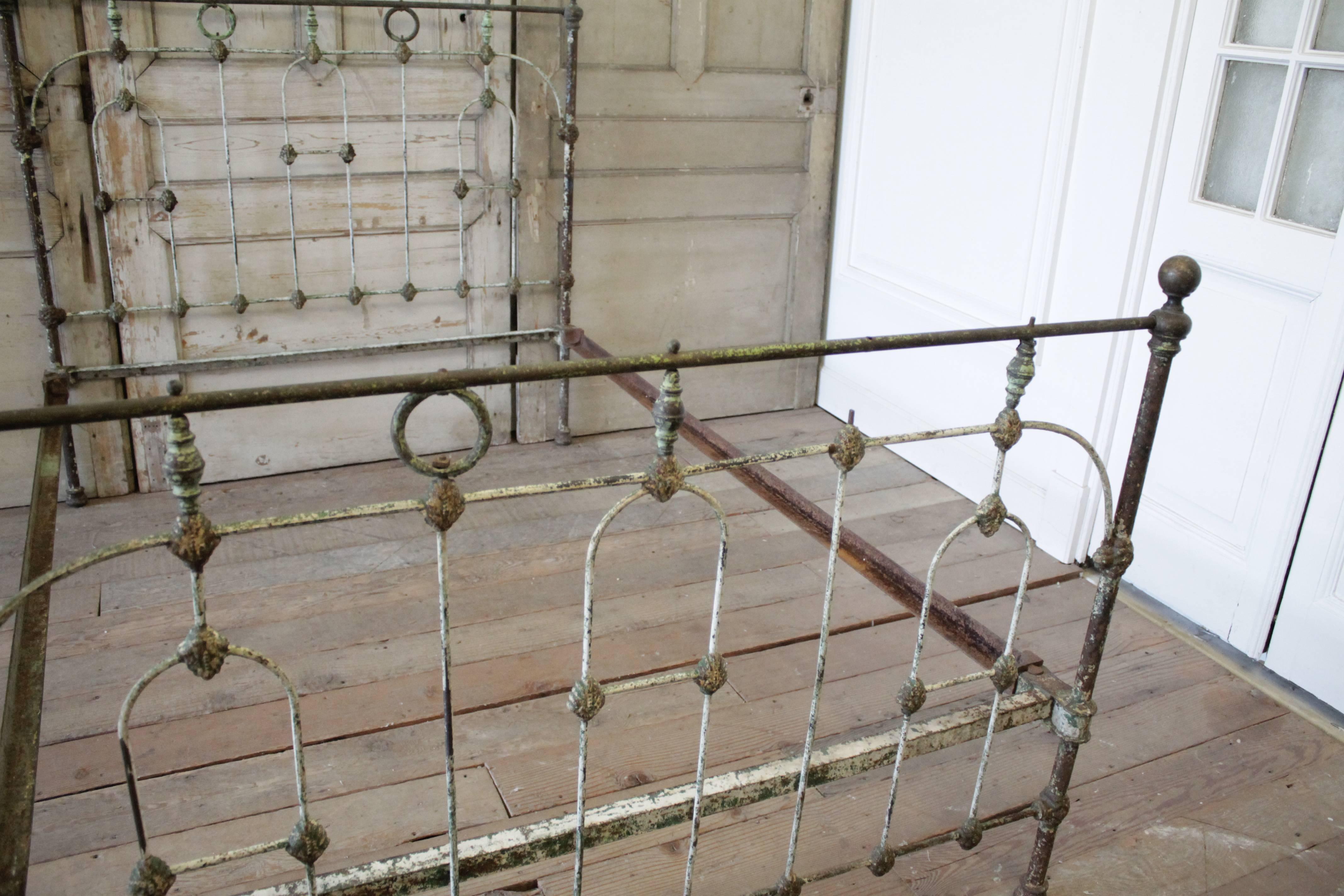 19th Century Farmhouse Style Antique Iron Bed with Original Patina In Distressed Condition In Brea, CA