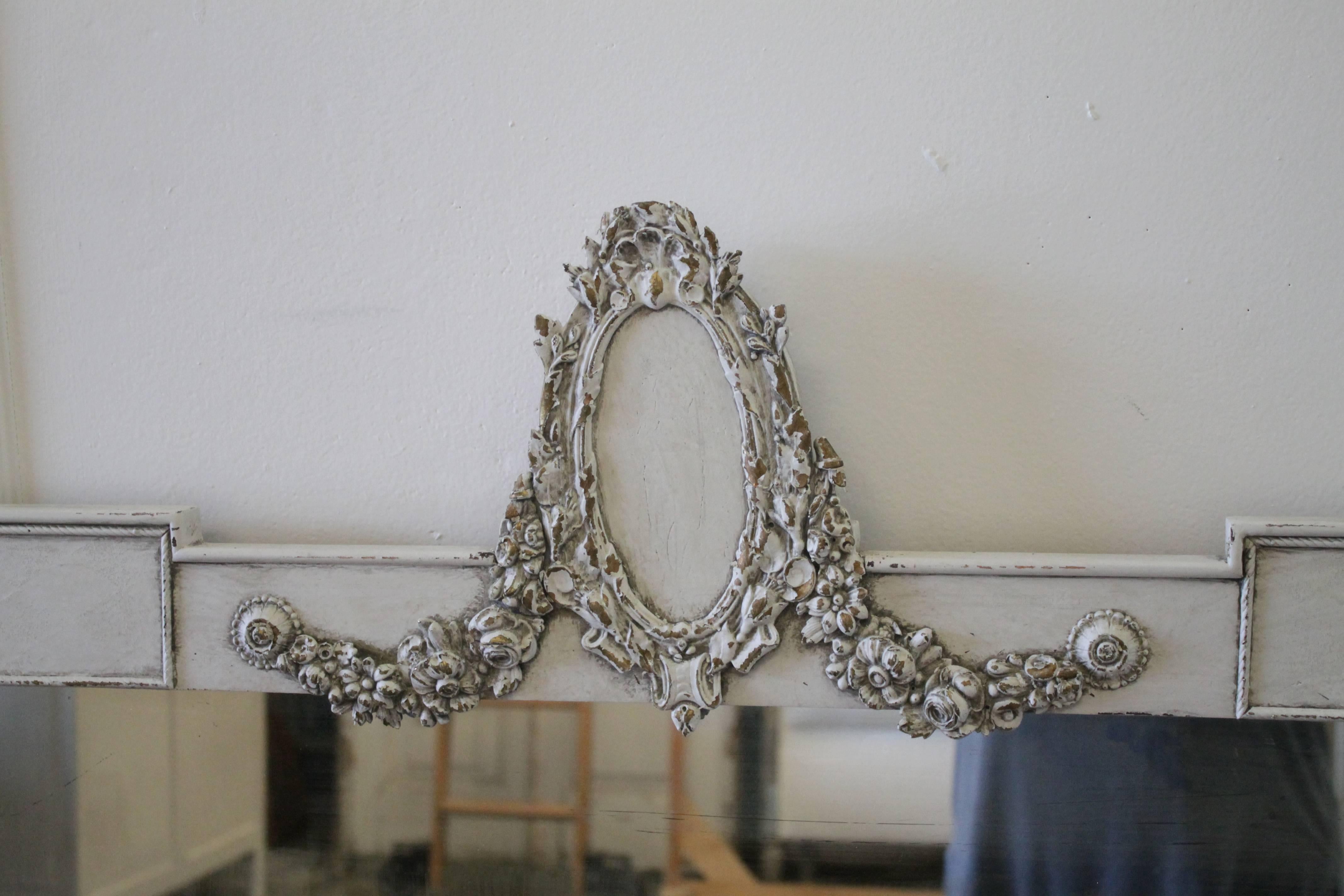 Vintage French mirror with bronze mounts painted in a light oyster grey color, subtle distressed edges, and antique patina. Mirror is solid wood, with wire ready to hang. Original mirror has slight areas of antique patina. We tried to show this in