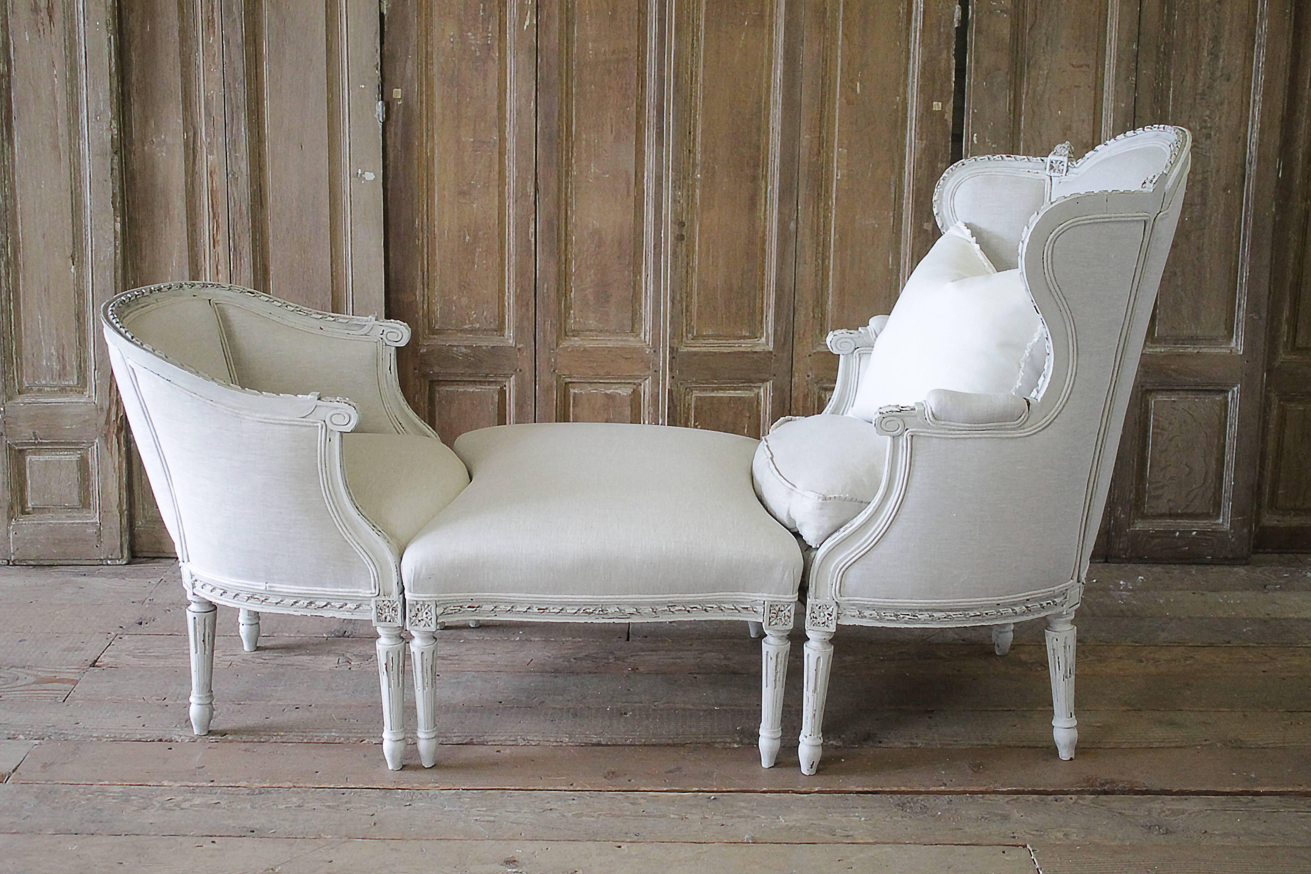 Beautiful three-piece set, painted in a soft oyster white, with subtle distressed edges, and finished with an antique glaze to give the look of a time weathered finish. The color is an off white, with subtle greyish tones. We have reupholstered this