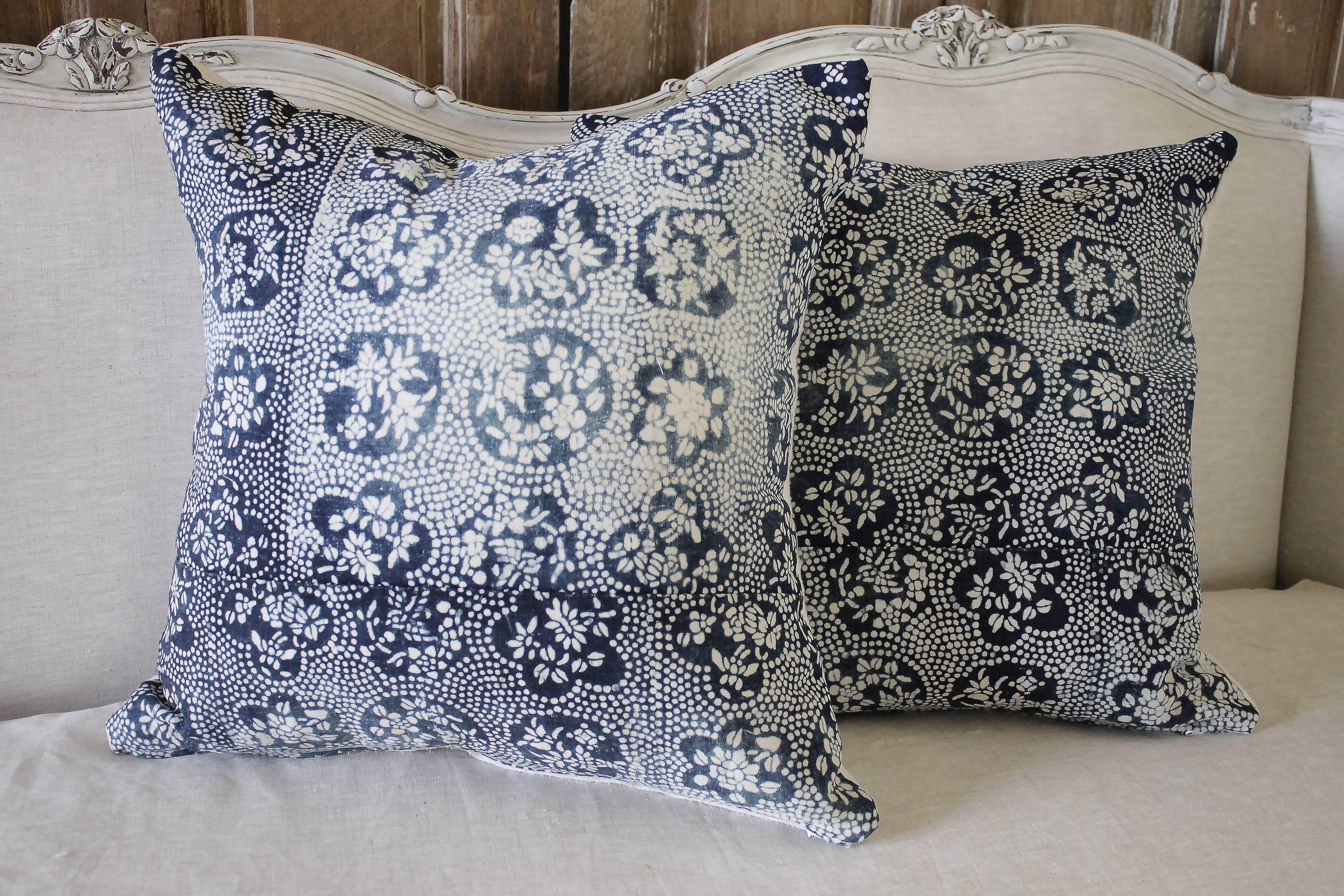 Beautiful Japanese Indigo floral and dot printed pillow. Cotton printed front is beautifully faded, creating a multi toned indigo pattern on the front. Towards the bottom of the face there is a seam going across with the pattern below going in a