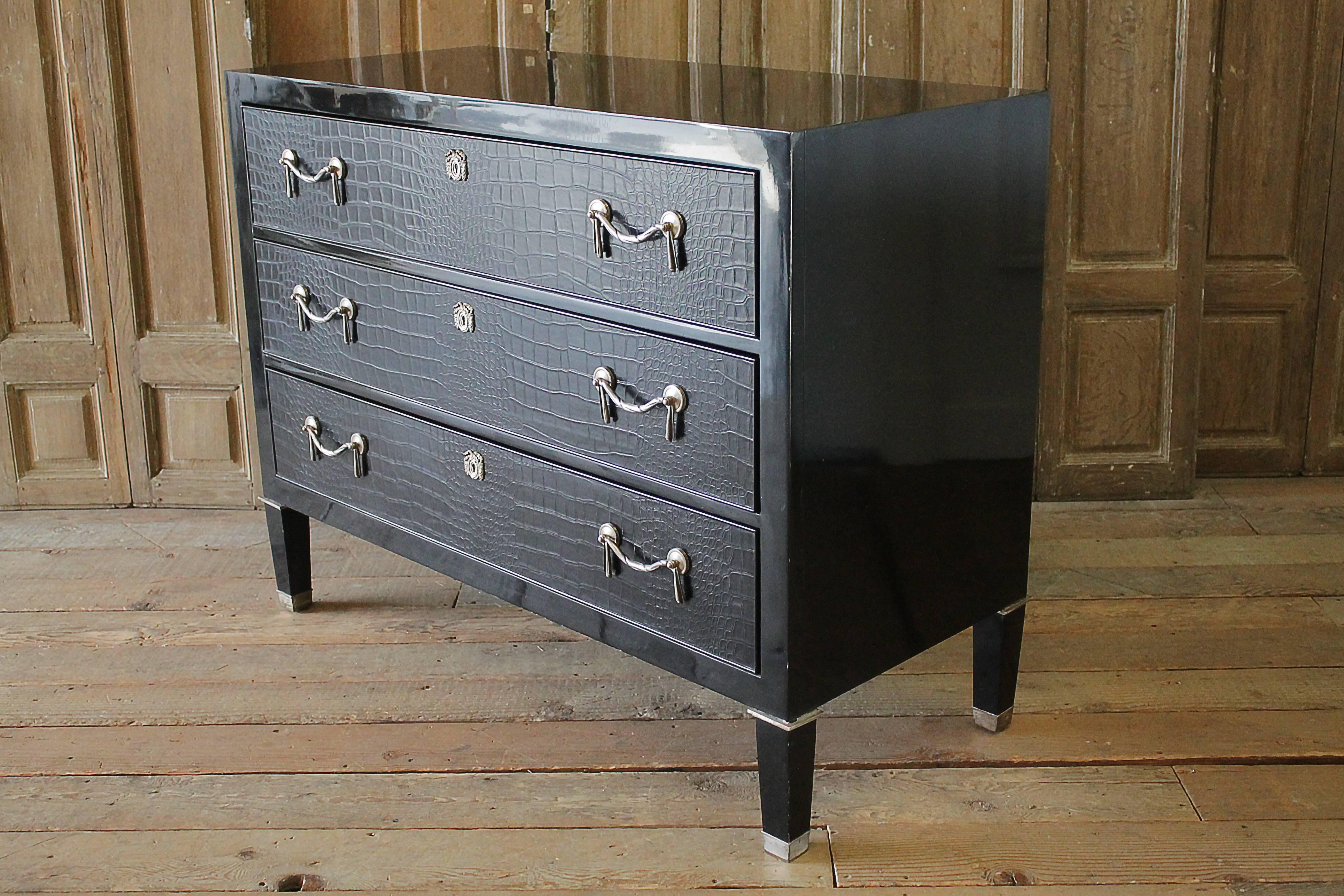 Brook street chest, black
RL number: 7620-48 piano black with antique silver hardware
MSRP: $11,995
This modern interpretation of an Empire Revival dresser has faux crocodile drawer fronts with antiqued silver garland pulls and