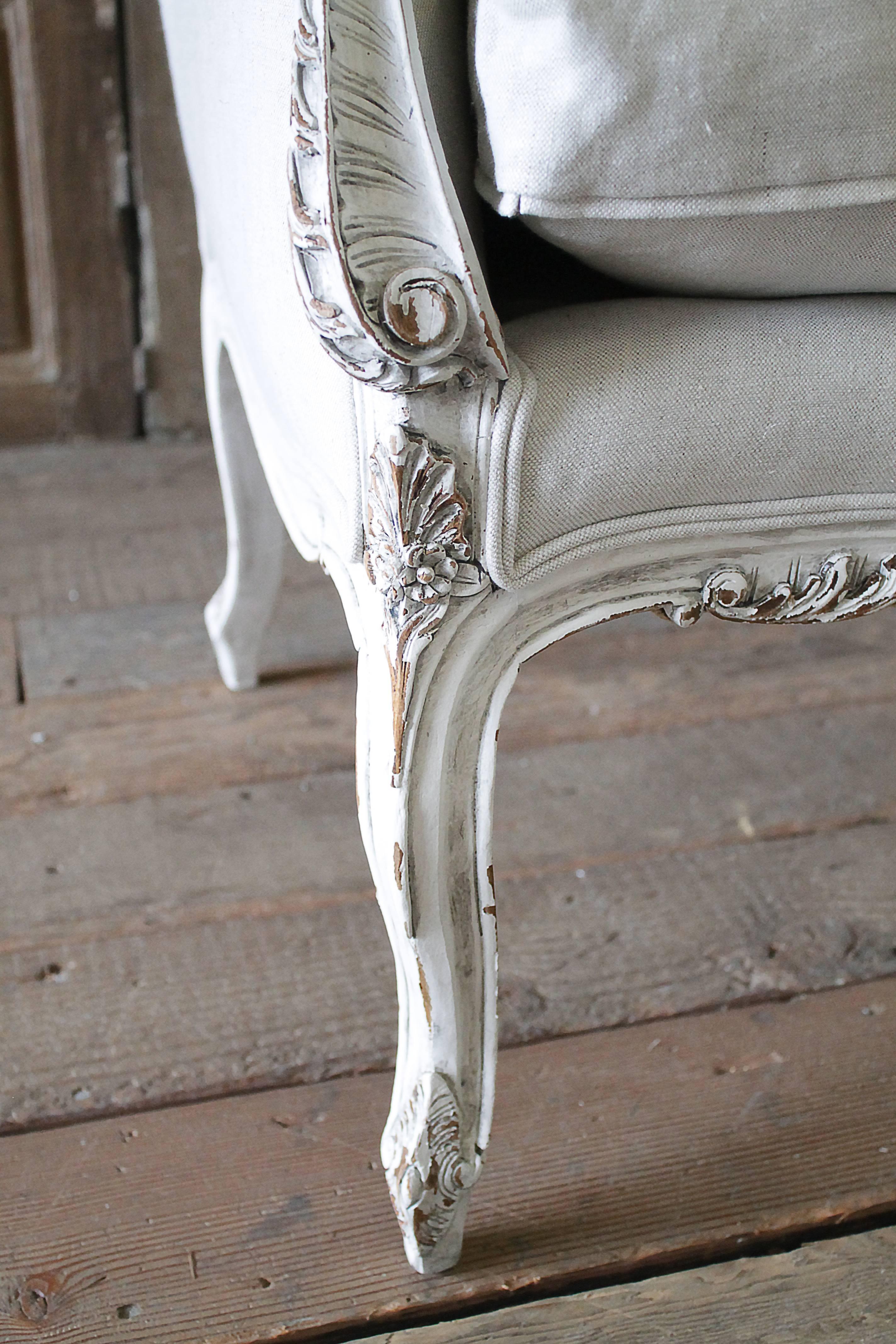 19th Century Carved and Painted Louis XV Style Wing Chair Upholstered in Linen 1