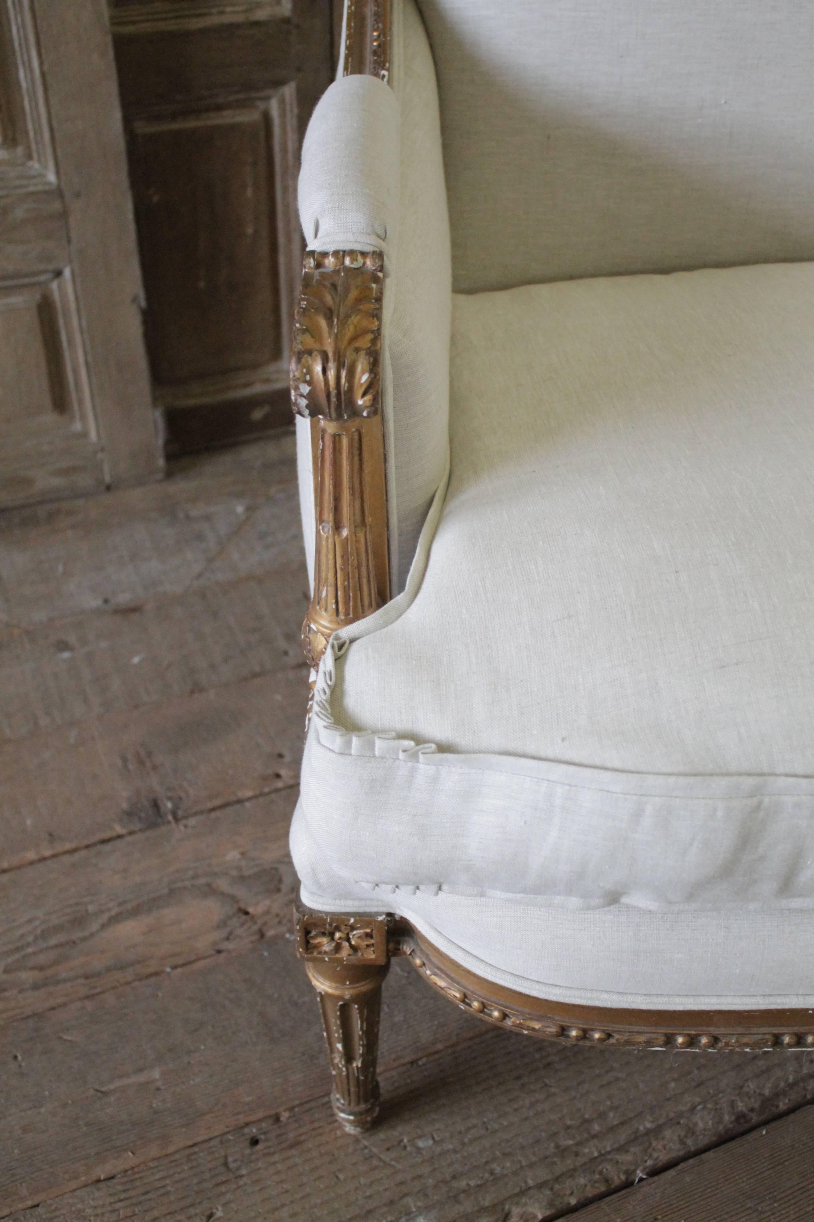 20th Century 19th Century Antique Giltwood Louis XVI Style Bergere Chair Upholstered in Linen