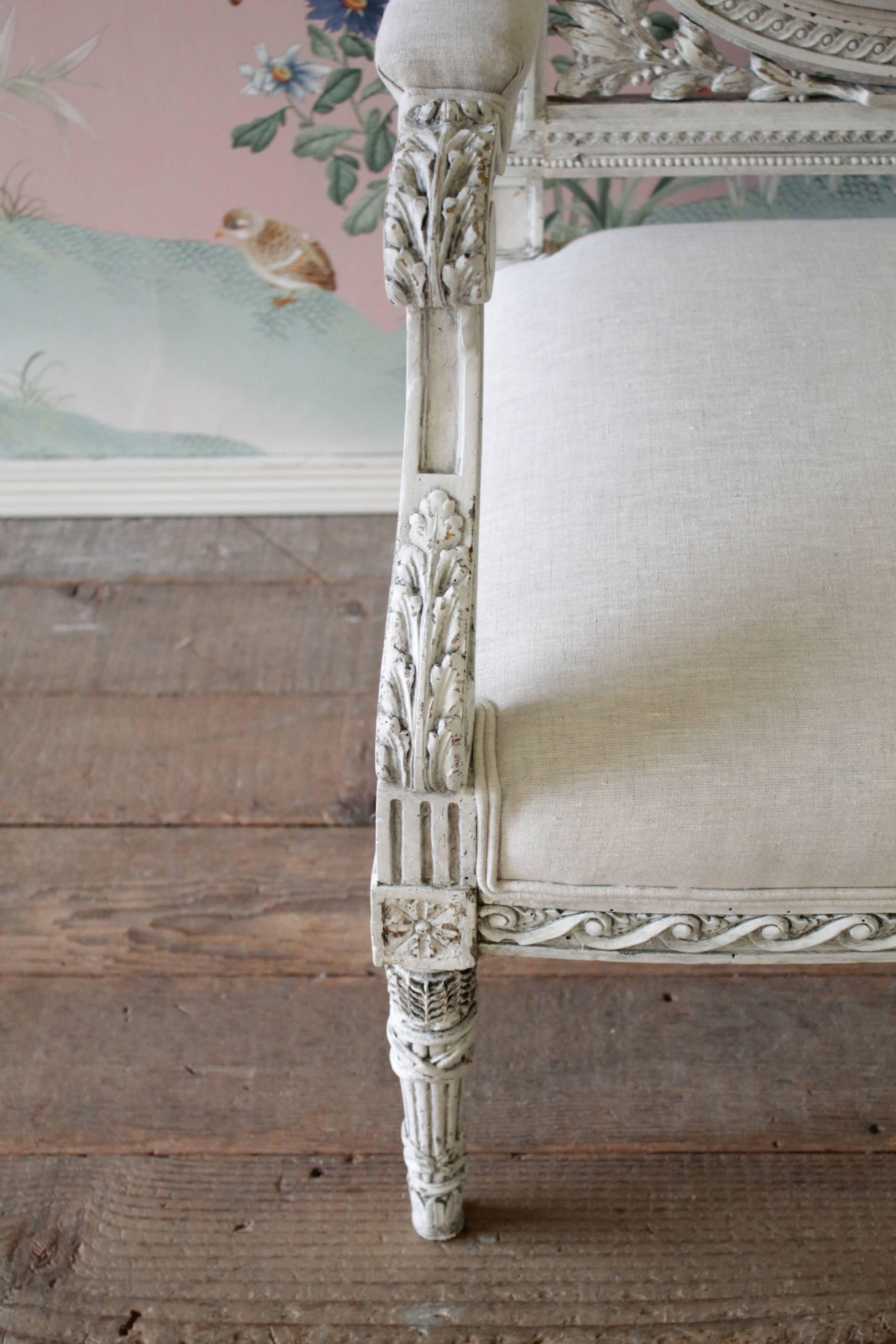 20th Century Antique French Louis XVI Style Loveseat Painted and Upholstered in Irish Linen