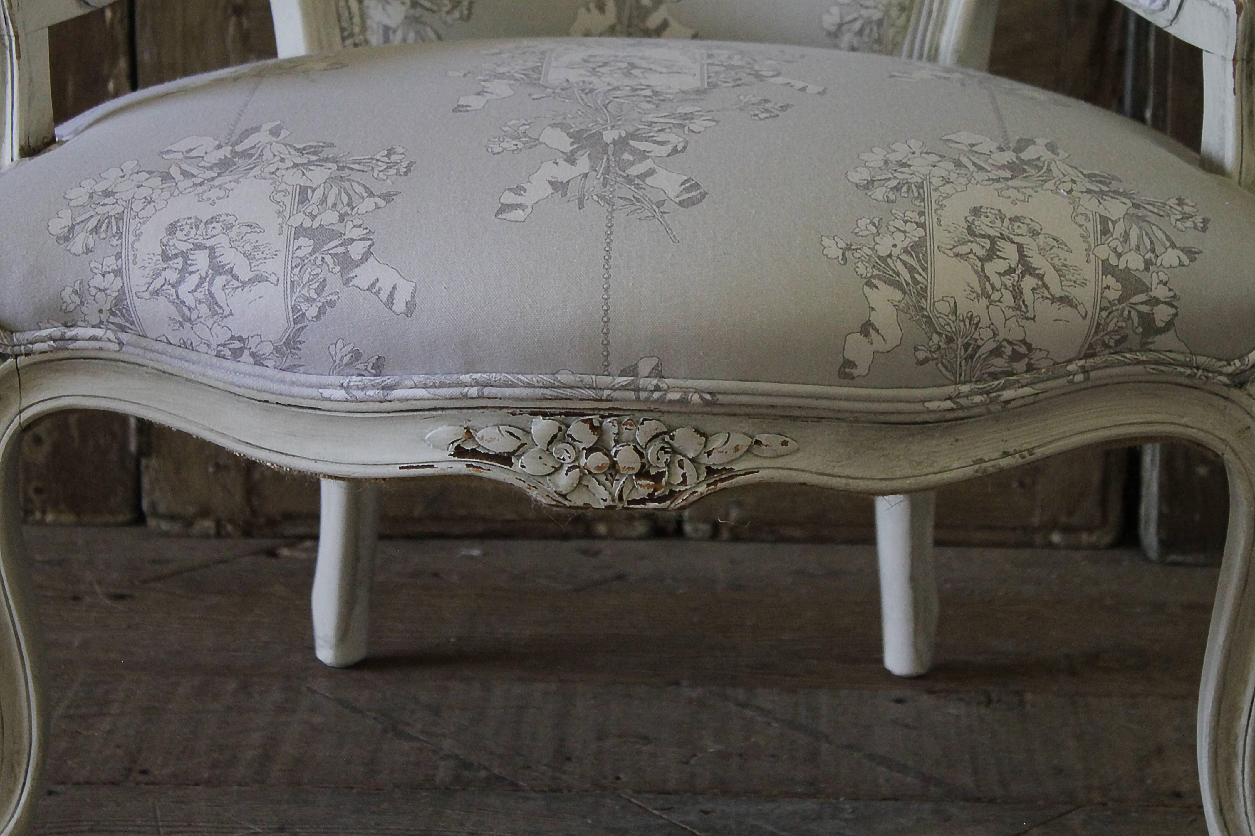 Early 20th century Louis XV style painted childs chair in grey Toile de Jouy
Painted in a soft oyster white finish, with subtle distressed edges, and antique patina. New upholstery in grey and white Toile de Jouy.
Very stabile, ready for everyday