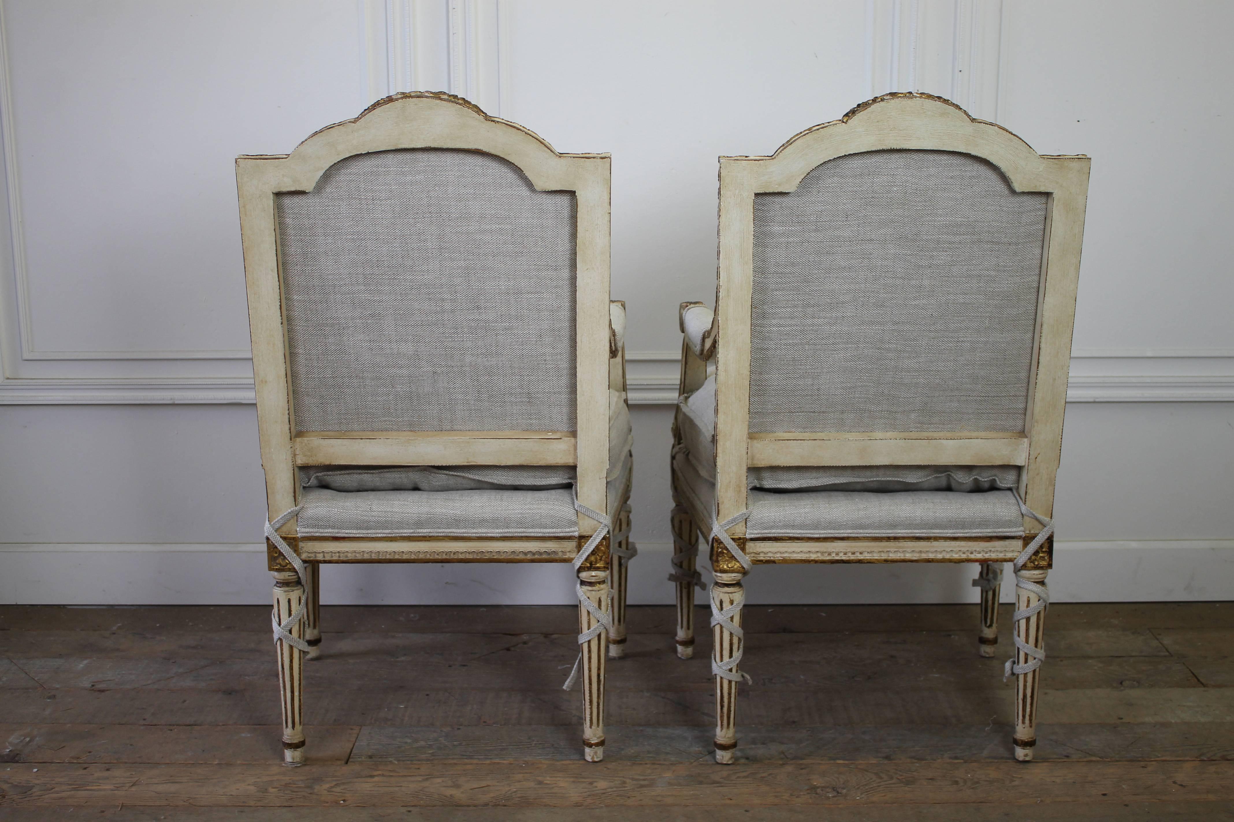Pair of 20th Century Carved Painted and Gilt Upholstered Open Armchairs 2