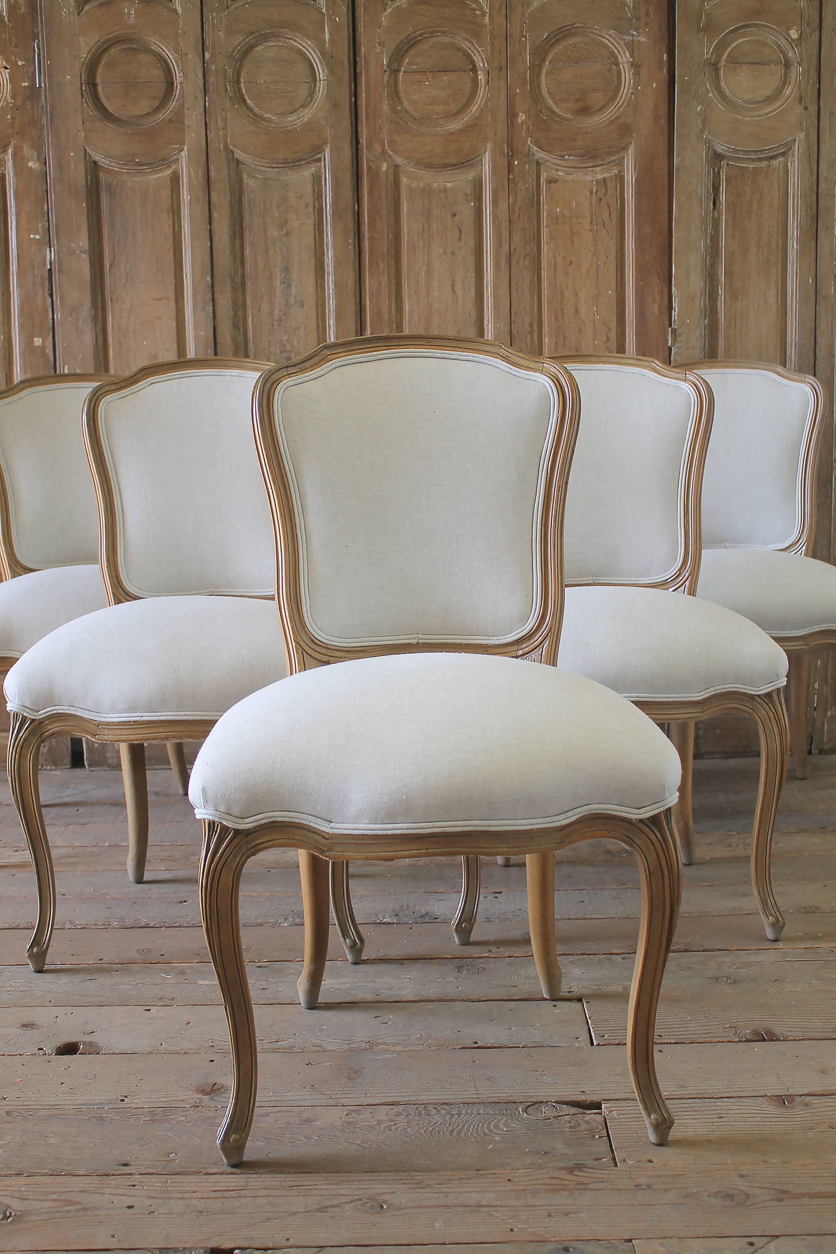 20th century set of six wood Louis XV style dining chairs in natural Belgian linen
Frames have newly retied spring seats, and brand new linen upholstery in our soft natural. During reupholstery each chair was made sure to be solid and sturdy, the