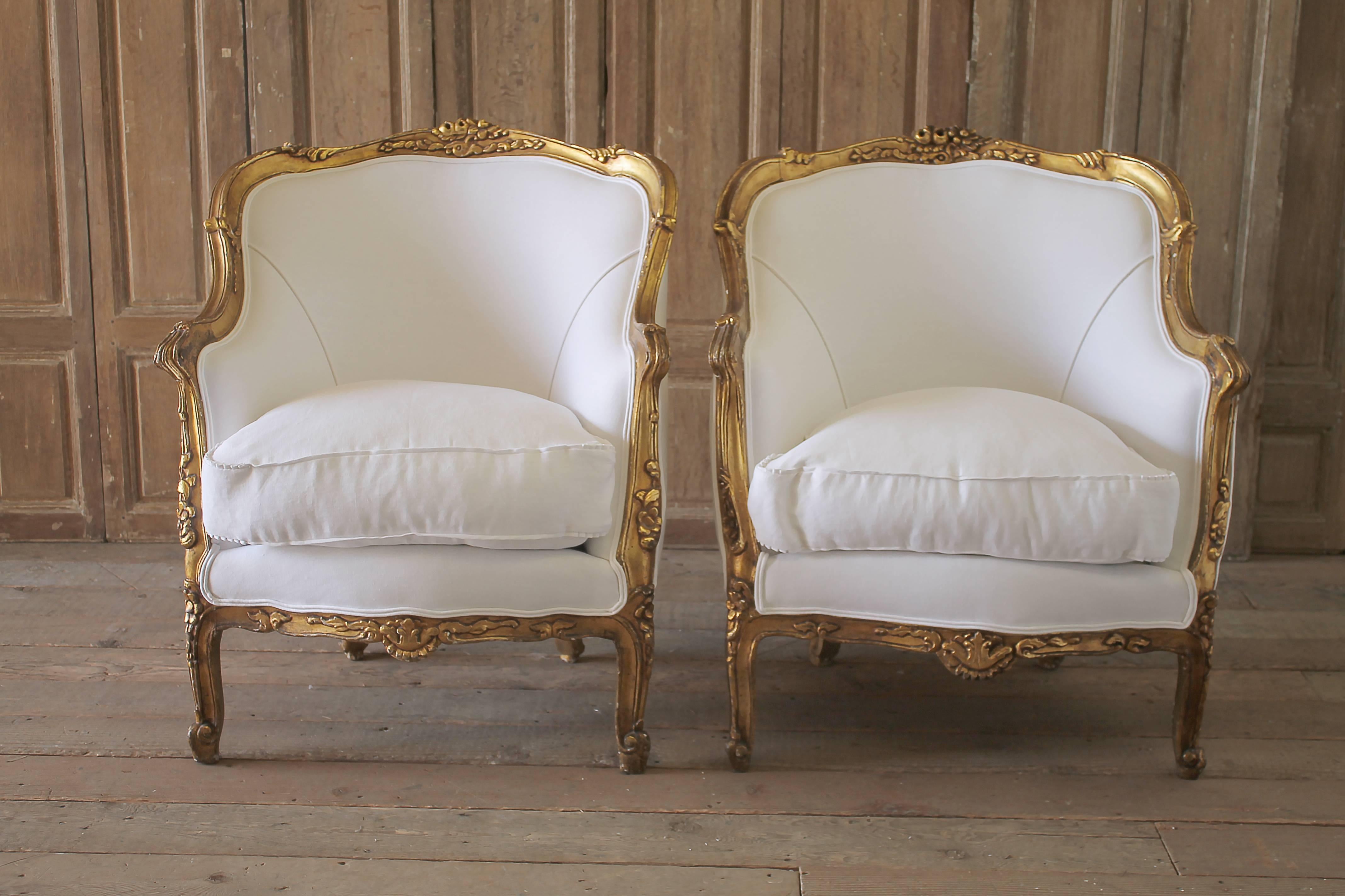 20th century giltwood carved bergere chairs in white Belgian linen
A brand new plump down cloud cushion has a zipper closure, finished with flange edge and pleated ruffle corners.
Measures: 30” W x 36” H x 30” D
Seat height 19”, seat depth 20”,