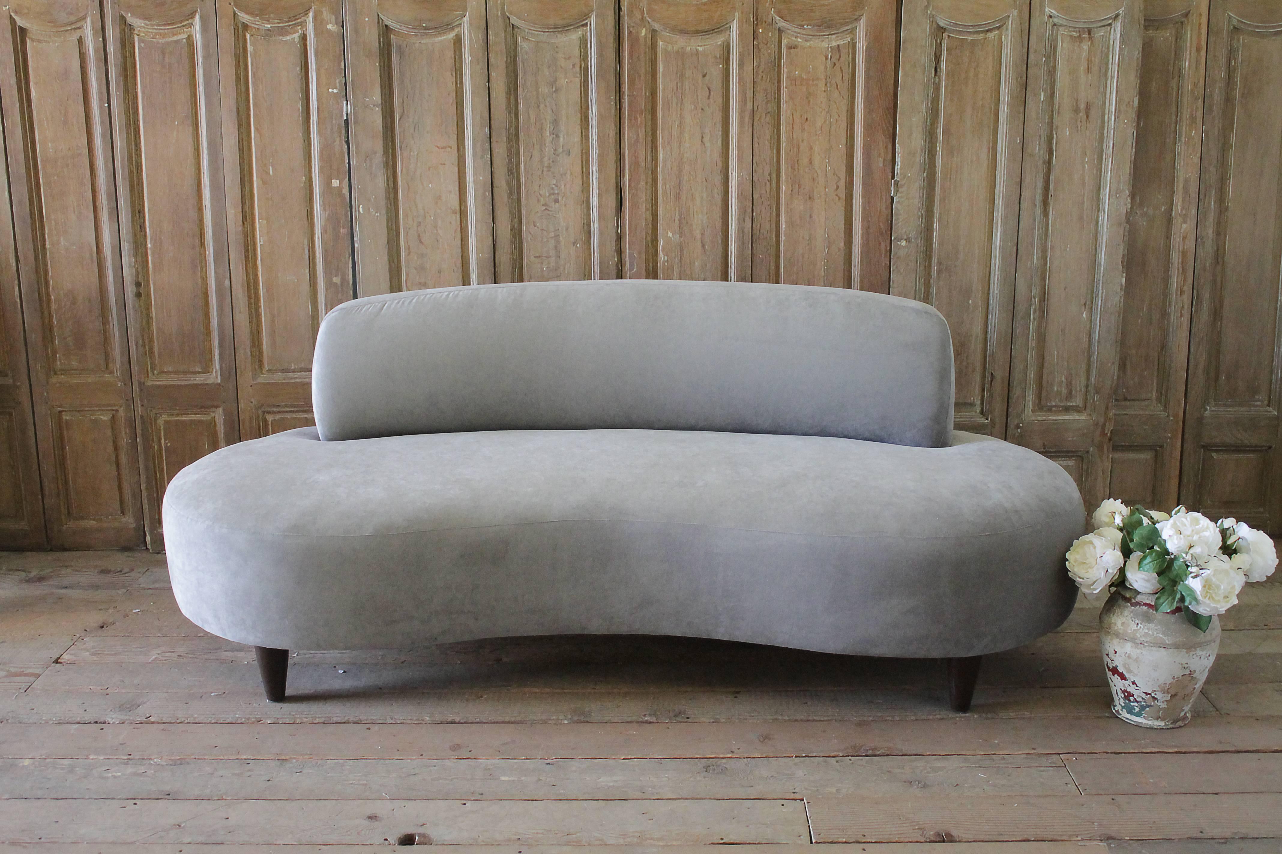 Vintage Noguchi style free-form sofa in pale grey velvet
We reupholstered this in a pale grey velvet, the legs are wood in a medium colored walnut color.
Measures: 80