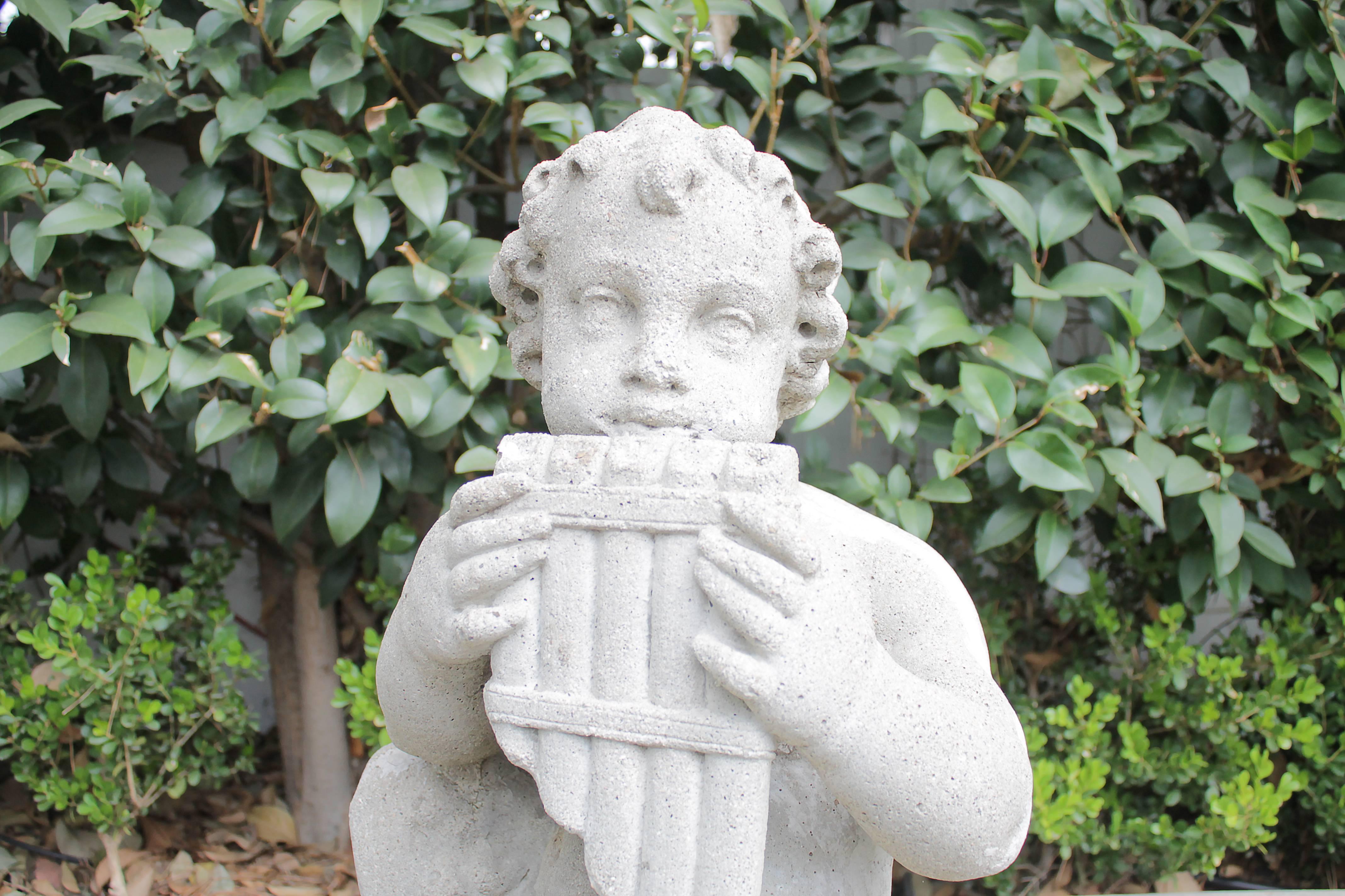 Vintage cast stone cherub with musical instrument
Measures: 15