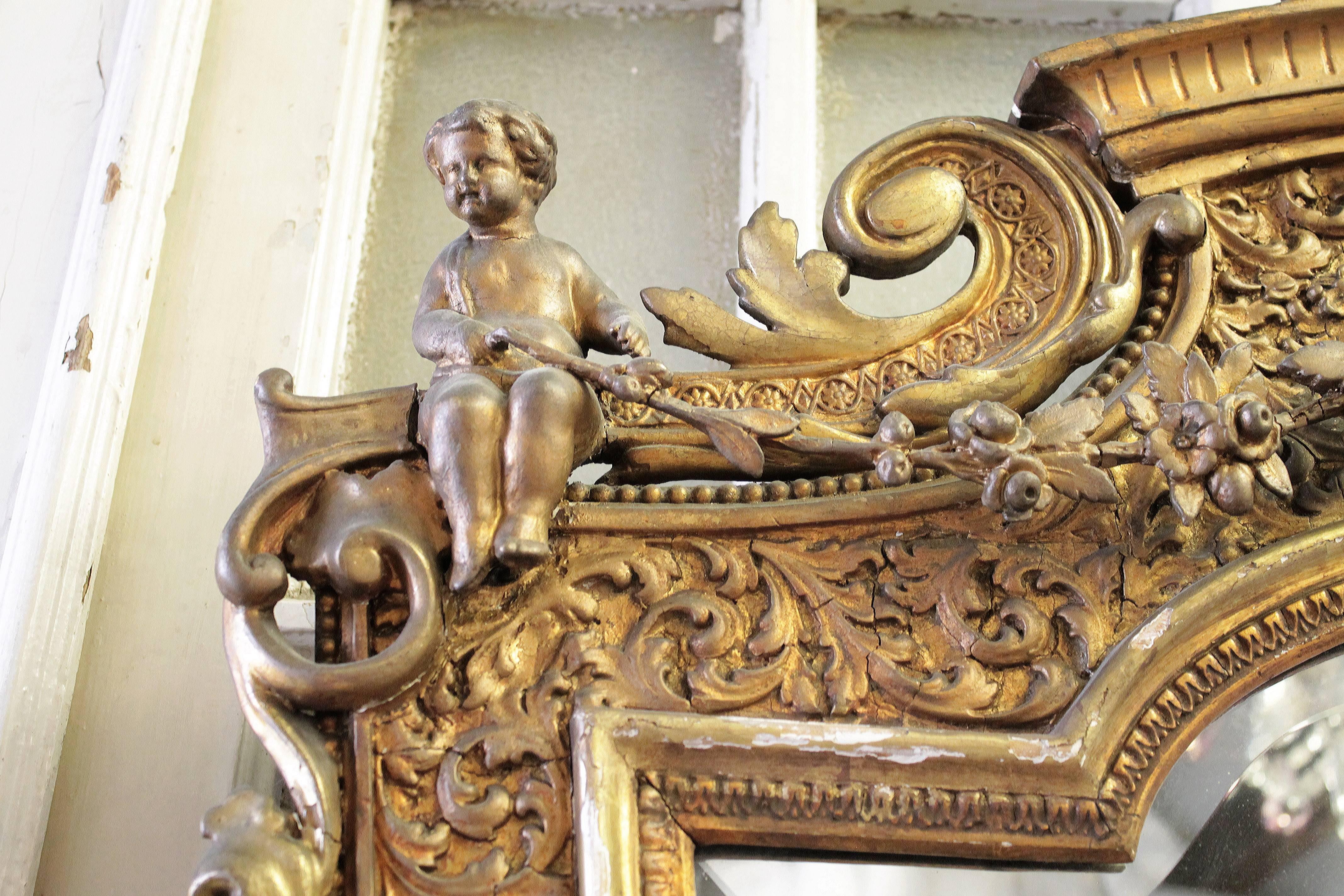 Carved Rare French 19th Century Pair of Giltwood Cherub Mirrors For Sale