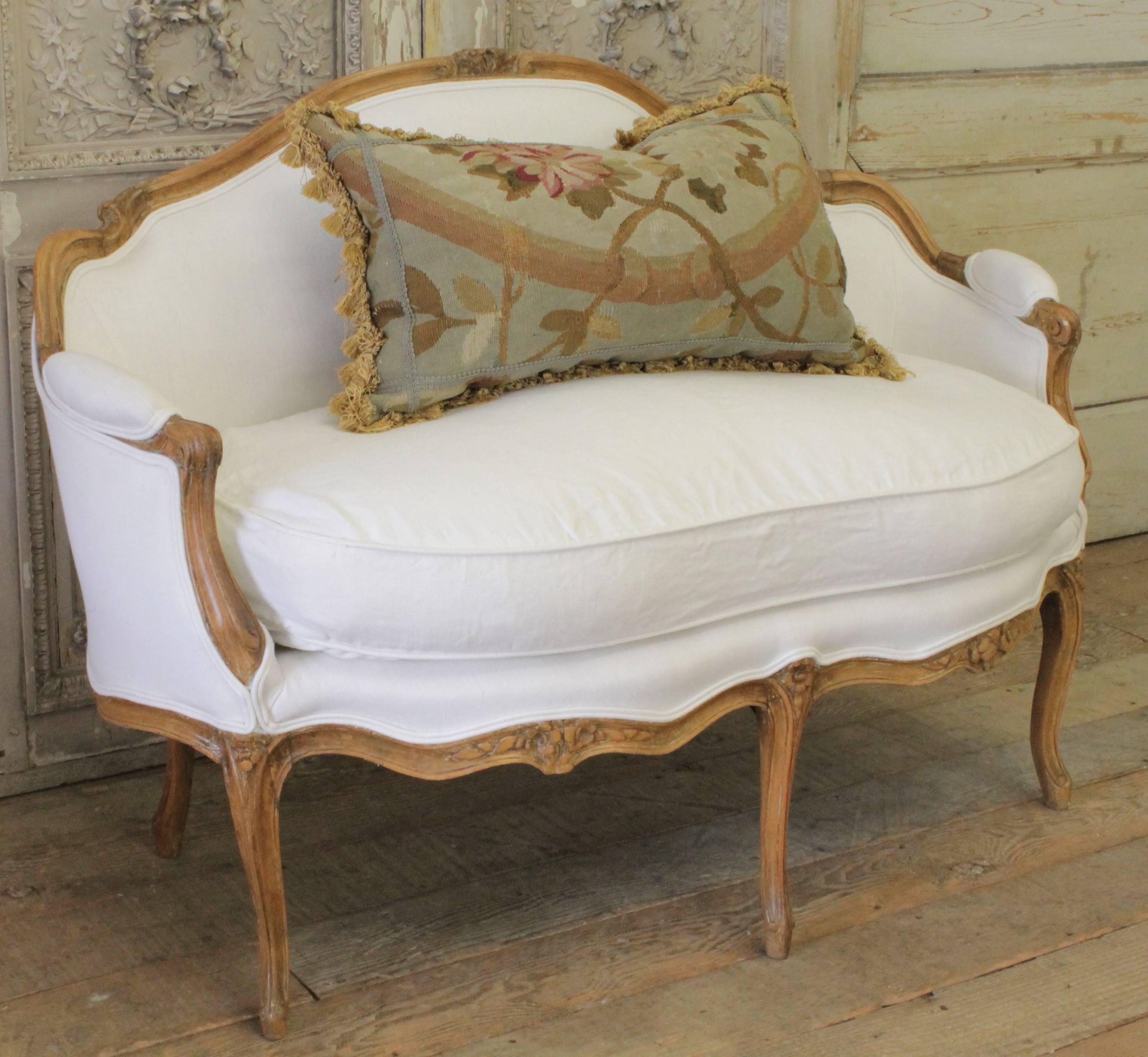 French Louis XV style hand-carved settee with new linen upholstery, circa 1860. Linen is 100% pure Irish linen, seat is slip covered and can be removed. Original caramel colored beech wood has a waxed finish.