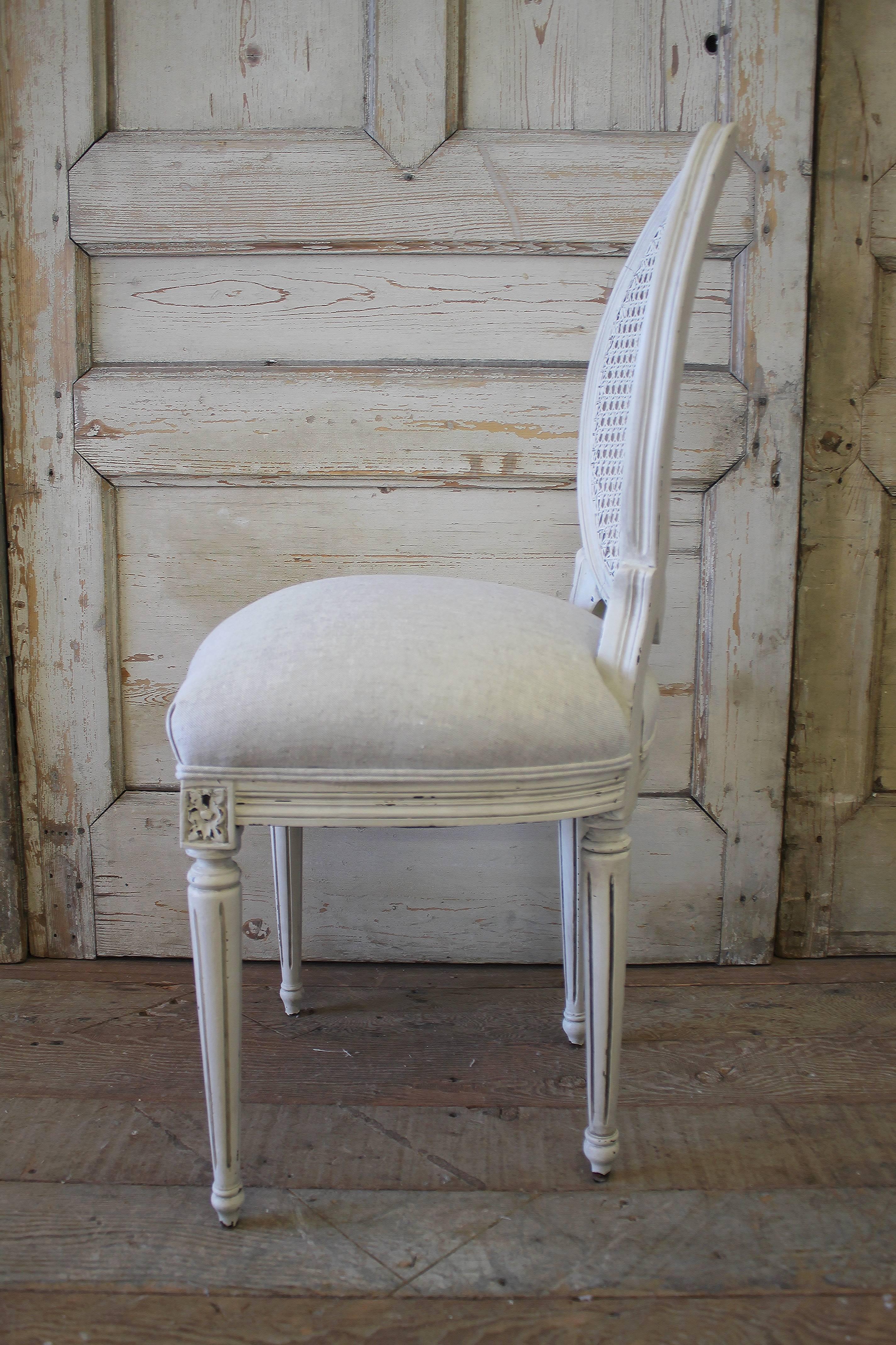 white cane back dining chair