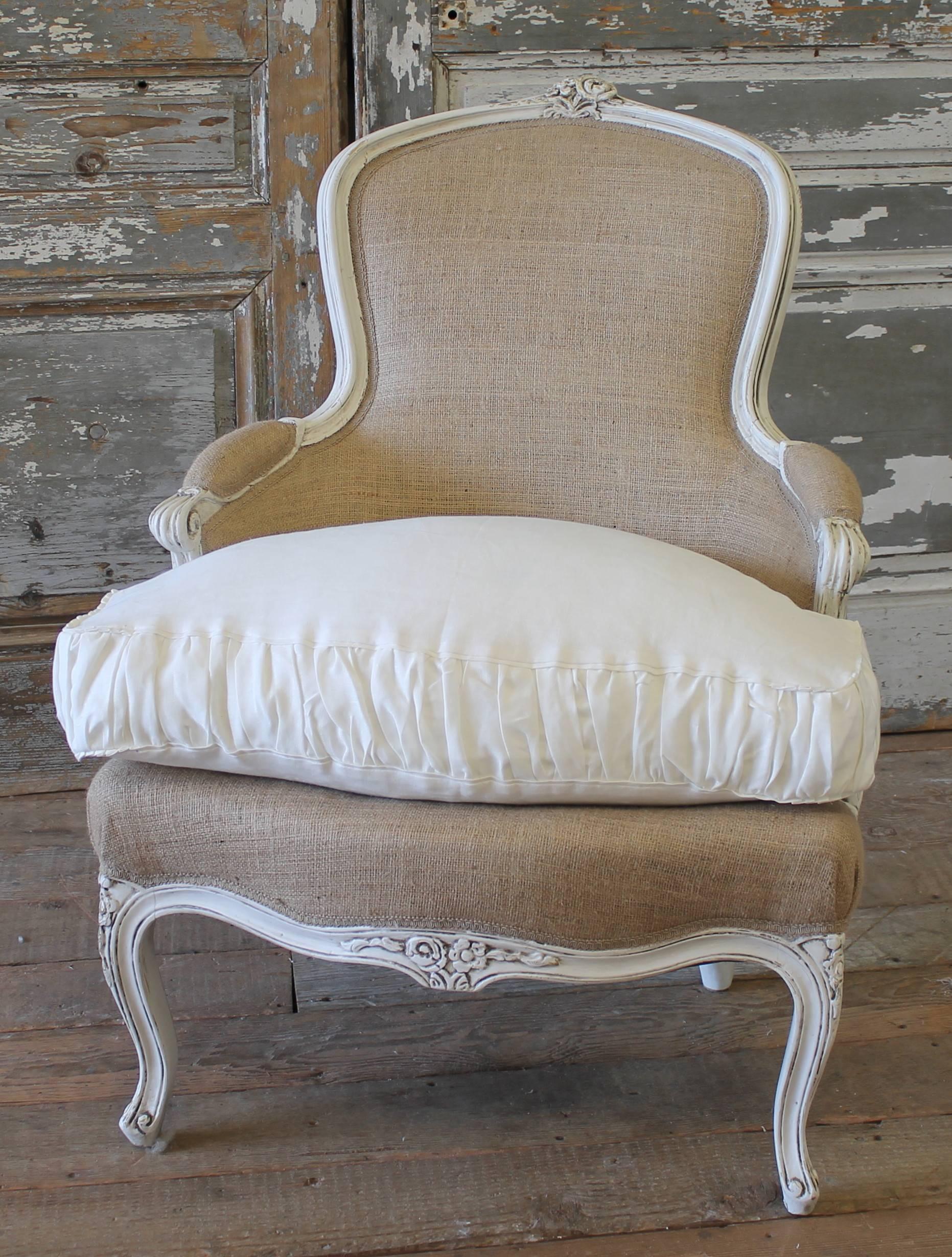 Beautiful French Country style chair, painted in our signature oyster white finish. A hand rubbed glazed patina has been added to give the look of a time worn finish. Delicate carvings and classic Louis XV style curved legs; we upholstered this in a