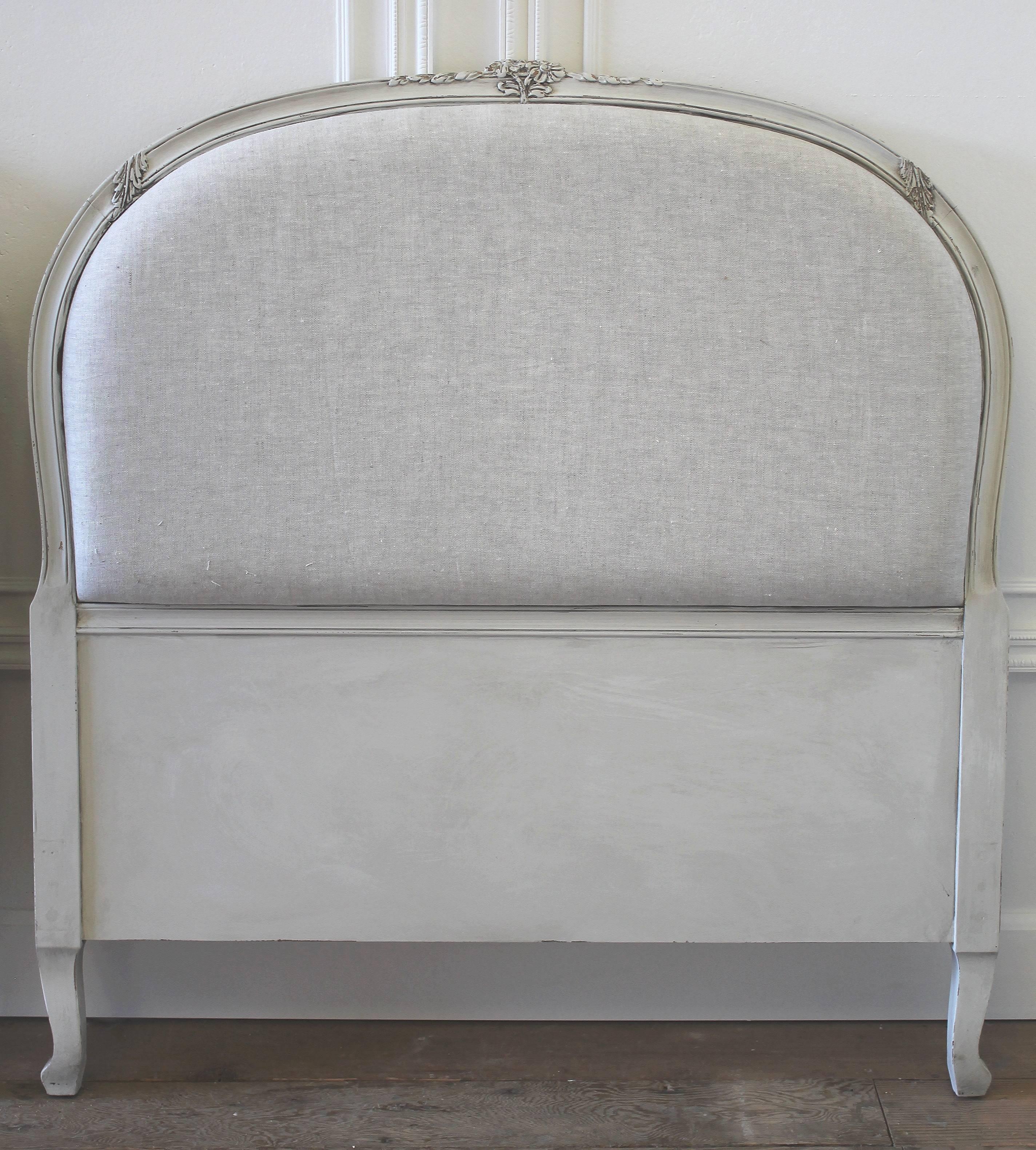 Vintage 1940s Louis XV style twin headboards have been painted in a soft oyster white finish, and reupholstered in our natural oatmeal 15 oz heavy Belgian linen. The backs are finished in a raw burlap.
Measures: 42