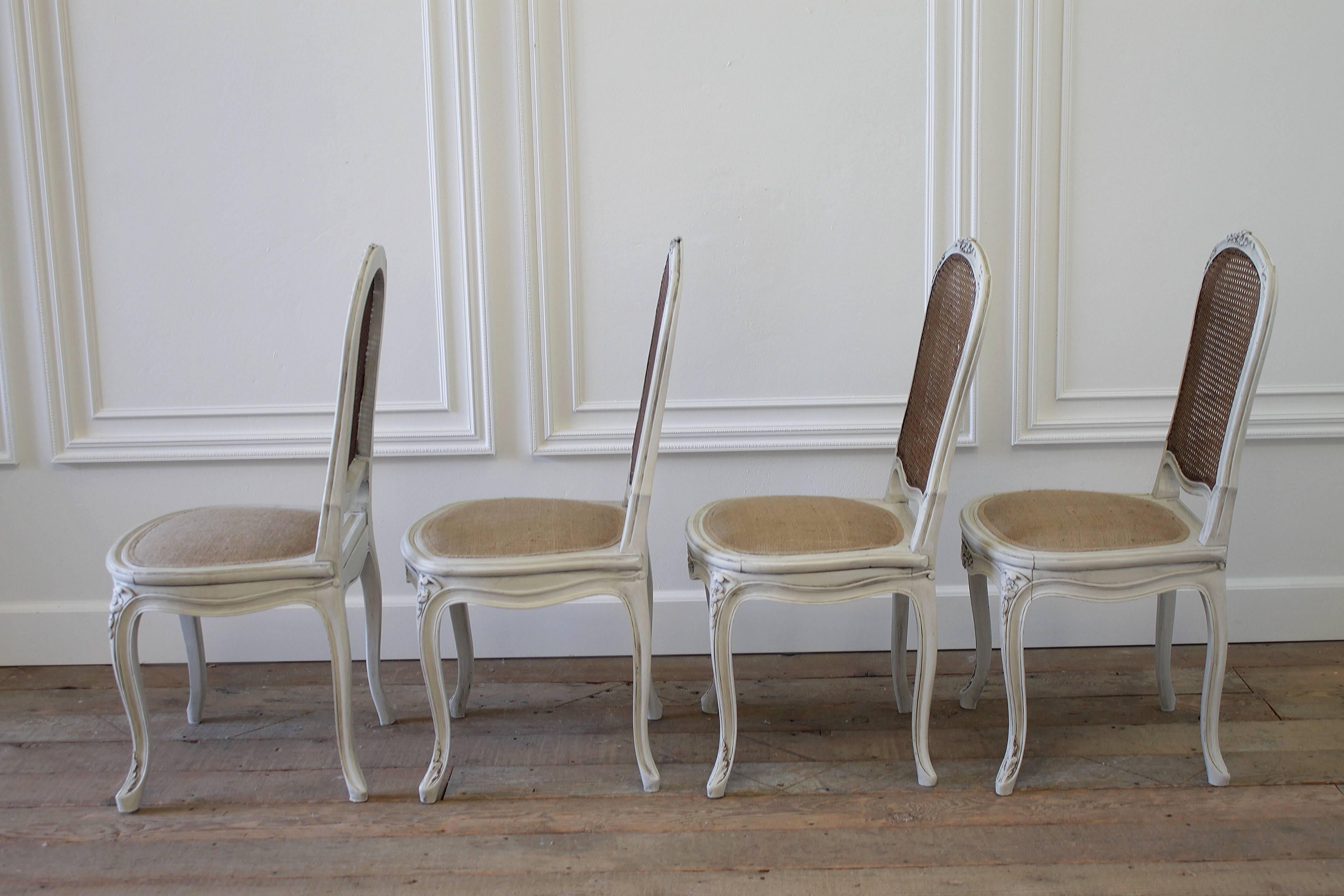 Carved Set of Four Louis XV Style French Painted Cane Back Dining Chairs