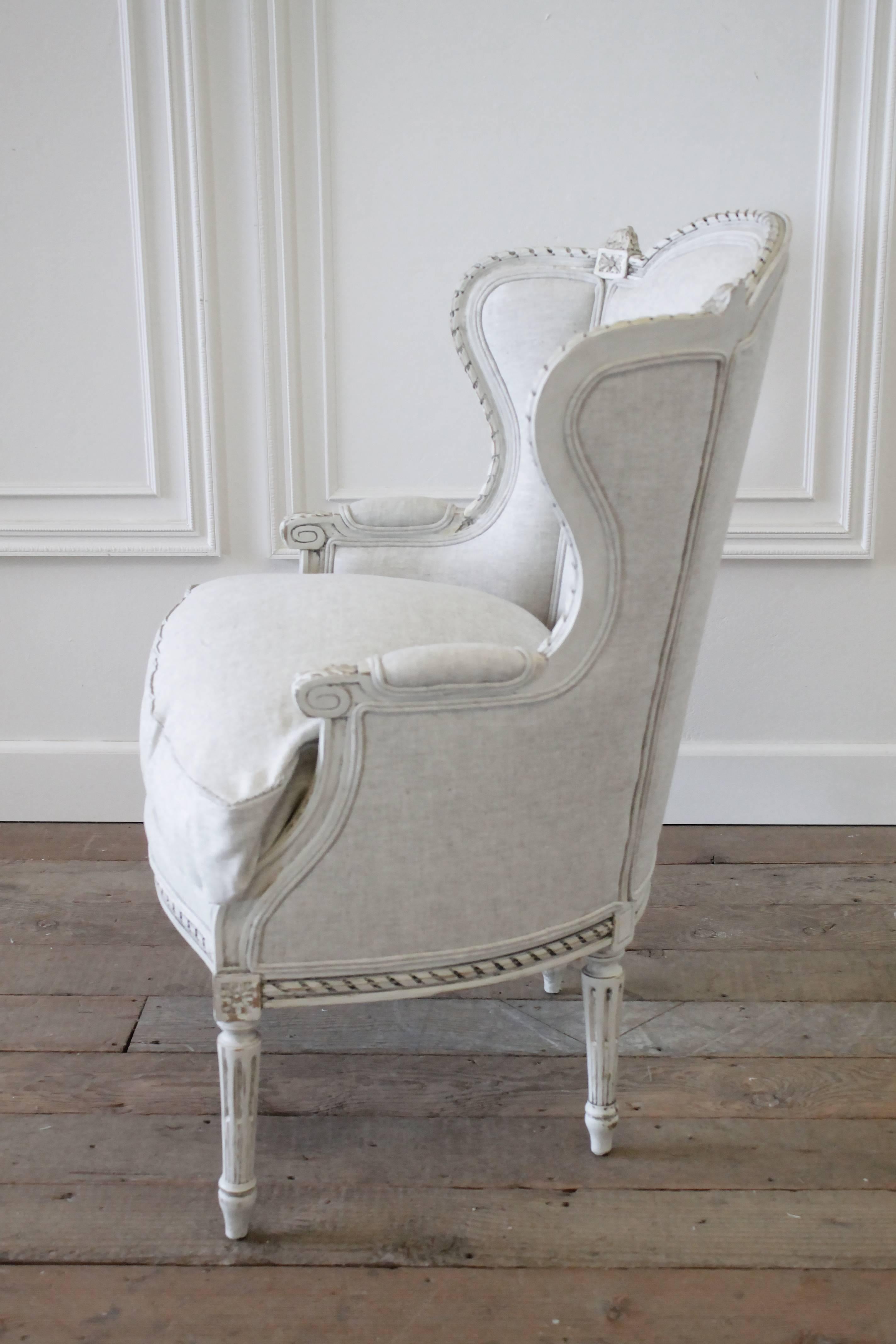 Carved 20th Century Painted Louis XVI Wing Chair in Natural Linen