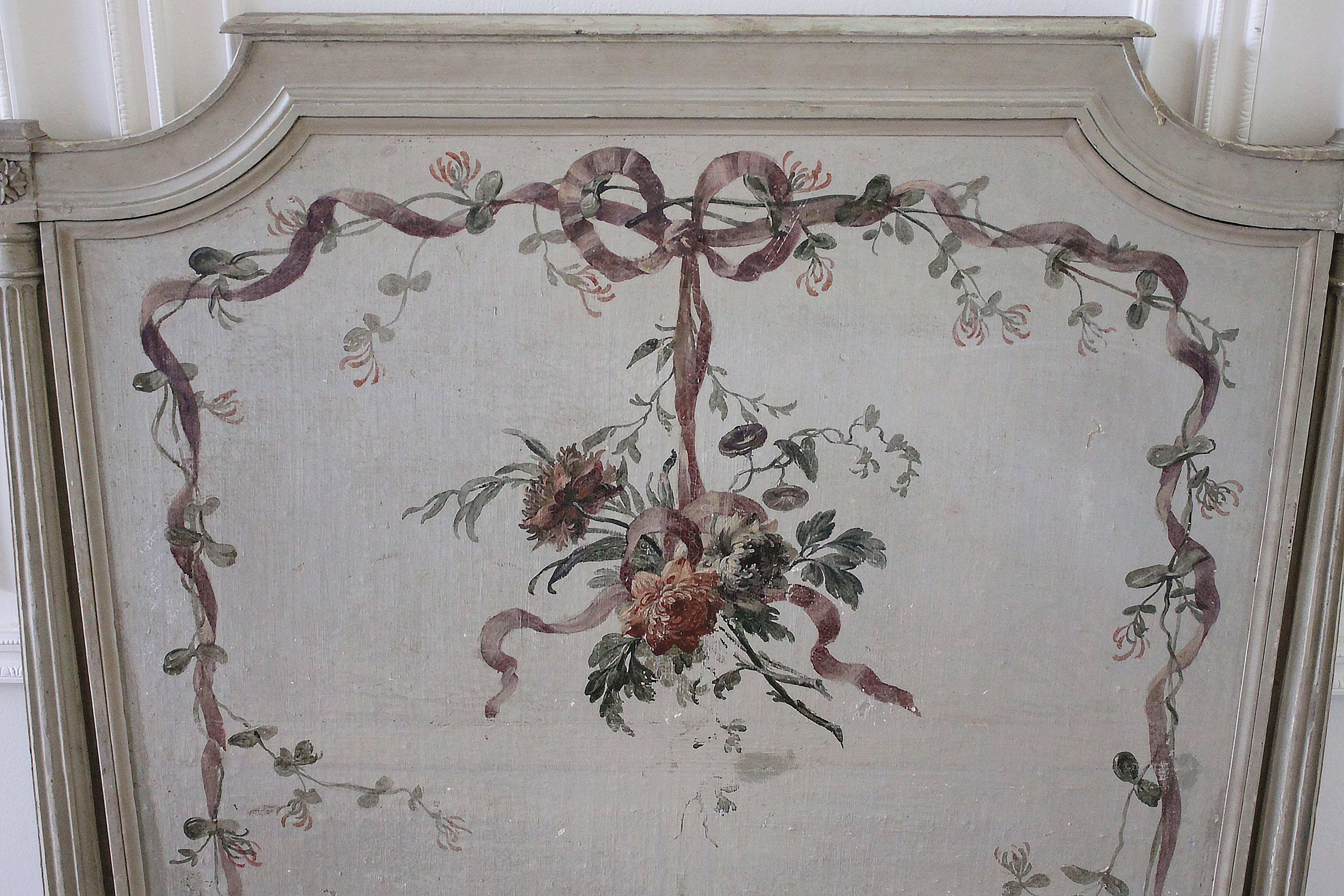One of my favorite decorative pieces, this originally was a daybed, that was hand-painted on both sides with ribbons and swags and roses on linen. The linen was glued well onto the wood bed plaque, and you can see bits of the painted finish that may