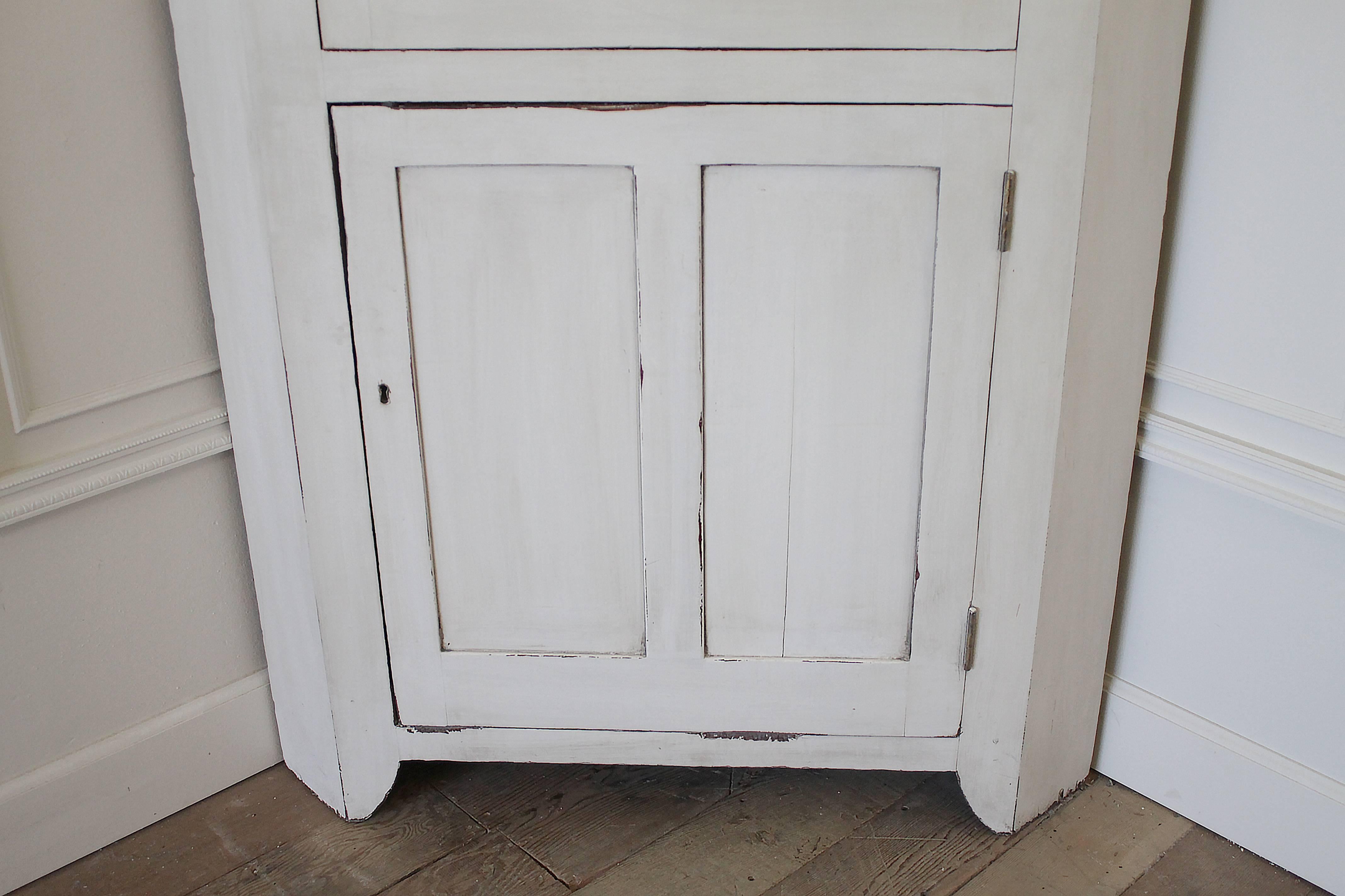 Painted in a subtle off-white with grey tones and original blue paint inside, circa 1870 doors open and close with ease, all the glass panes look to be original with a subtle waviness to the glass.
Measures: 43
