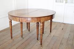 Early 19th Century Dining or Entry Table with eight Legs and Caster Wheels