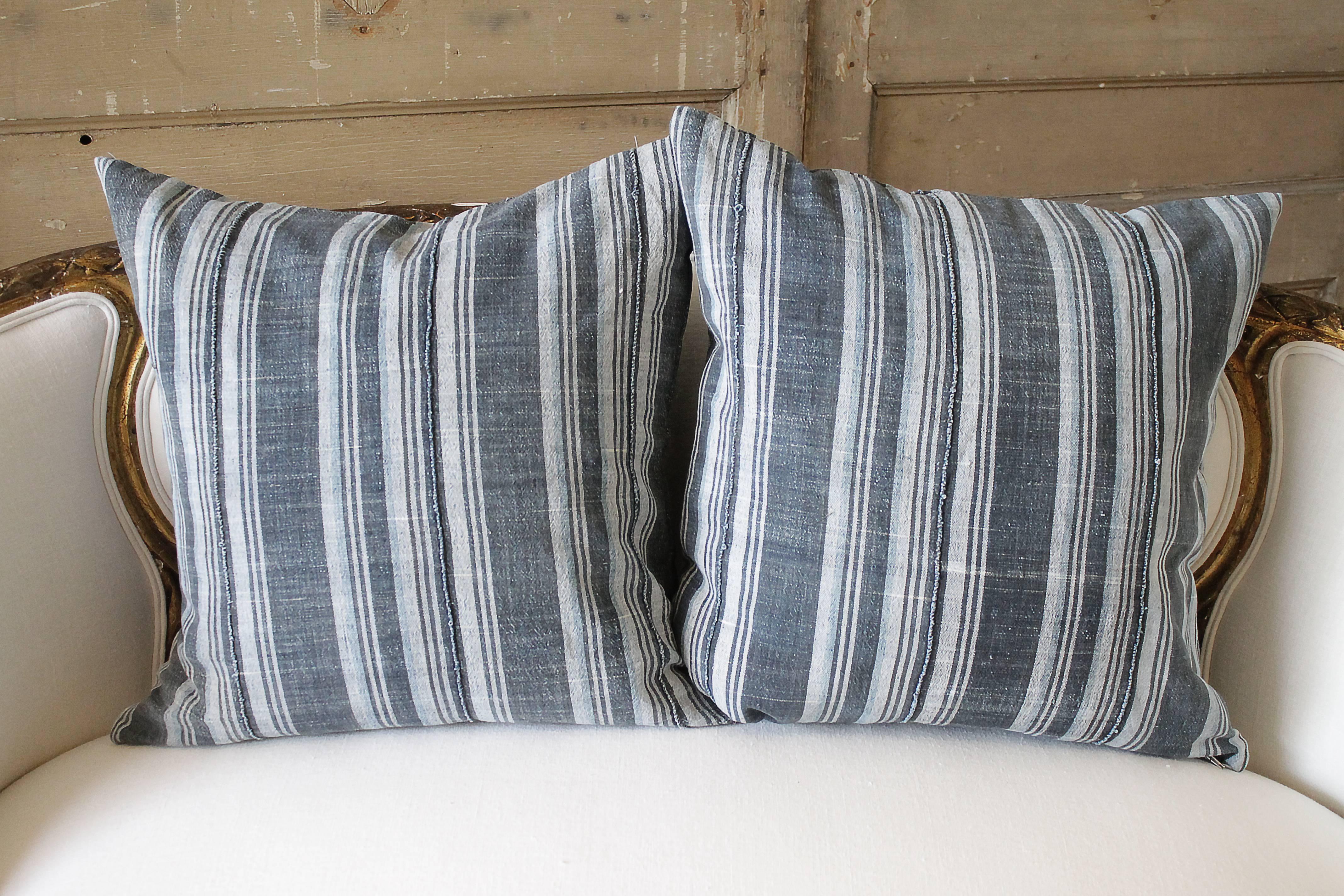 Custom-made pillow by Full Bloom cottage out of vintage indigo stripe linen with hand-stitched seams.
We pre wash all of our linens for freshness and softness, and all pillows are sewn with an overlock seam to prevent fraying. Zipper