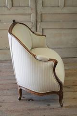 19th Century Walnut Rose Carved Settee Upholstered in Stripe Linen