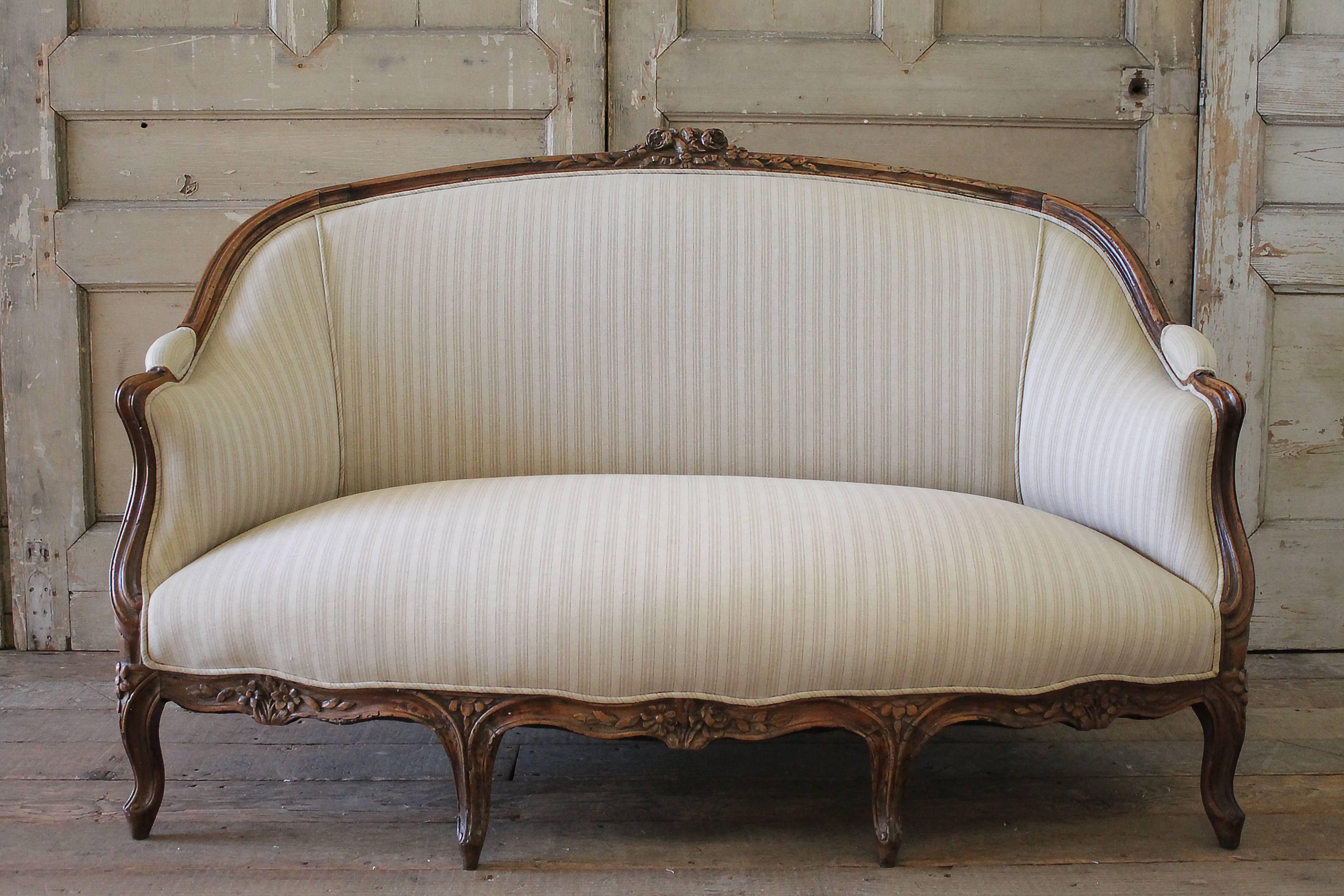 Louis XV 19th Century Walnut Rose Carved Settee Upholstered in Stripe Linen