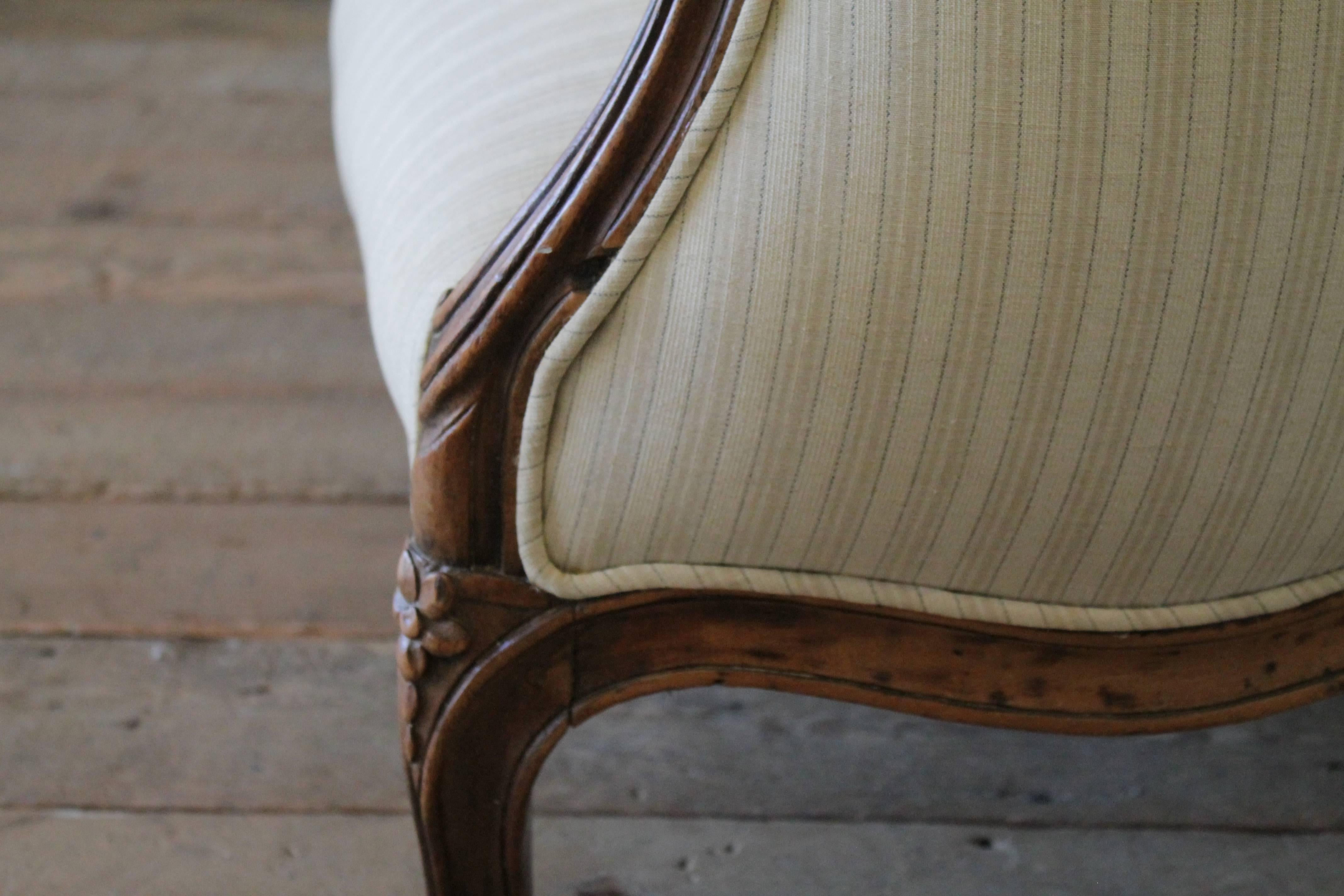 19th Century Walnut Rose Carved Settee Upholstered in Stripe Linen 3