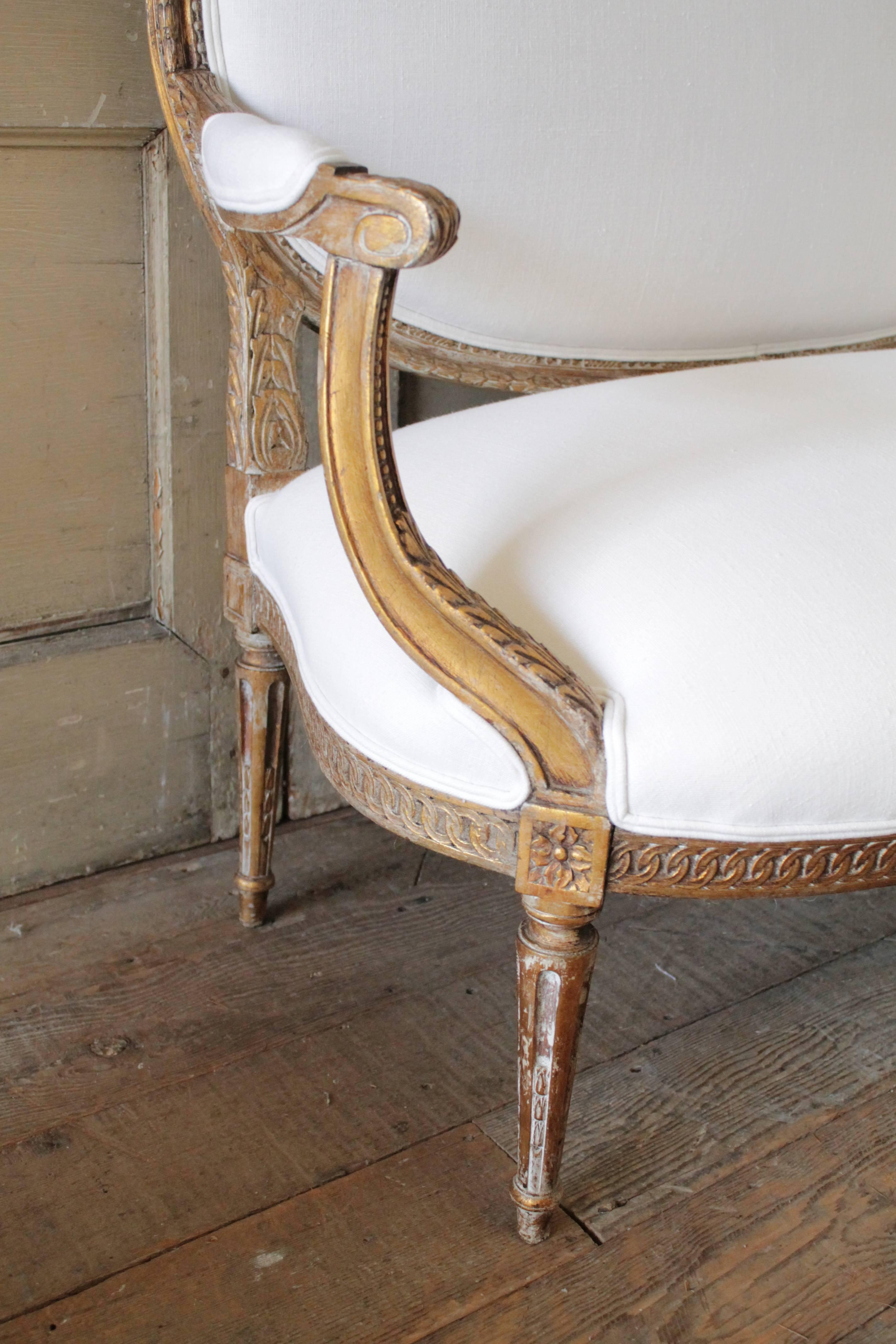 Carved Louis XVI Style Giltwood Settee Upholstered in White Irish Linen