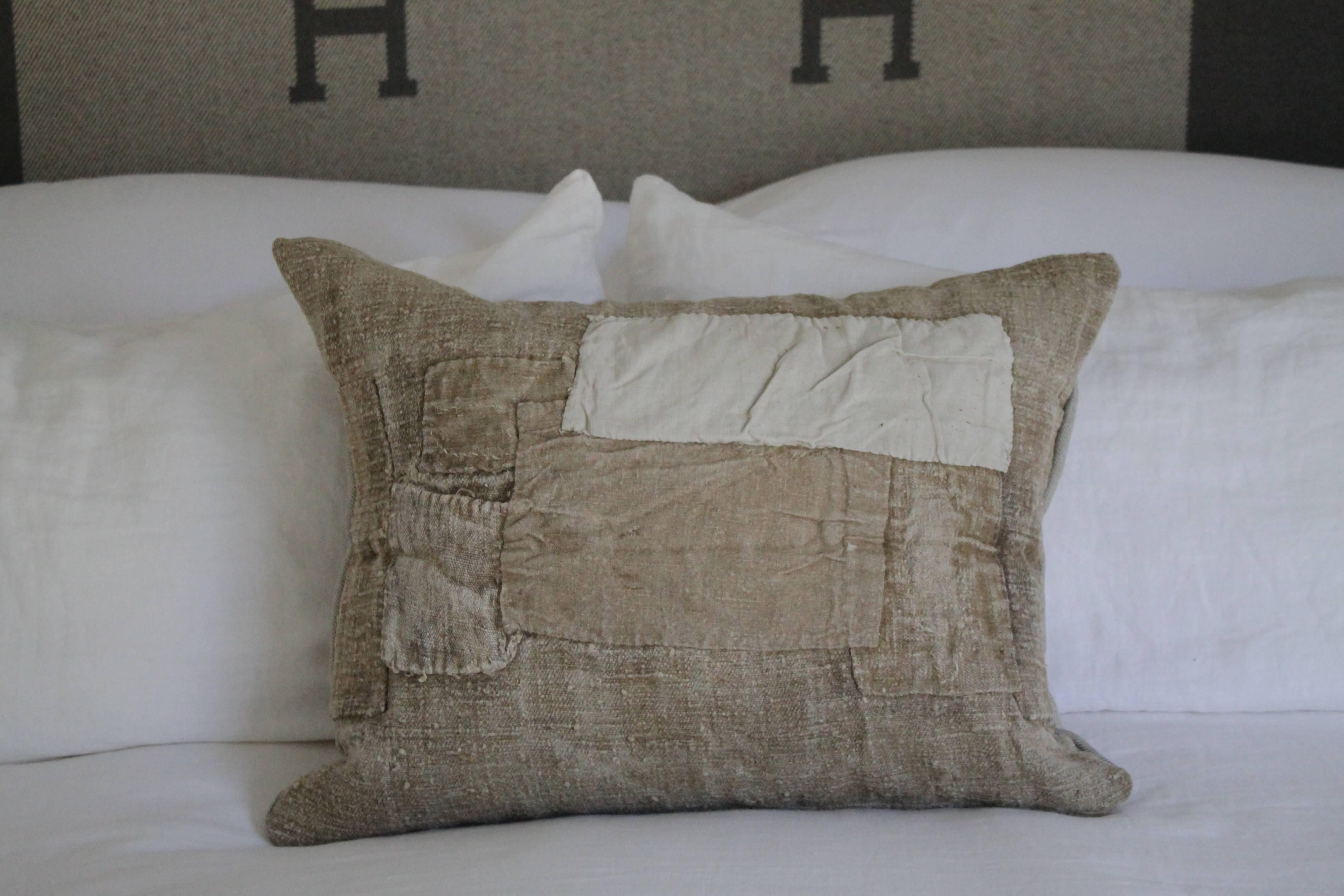 Four Custom Made Patchwork Grain Sack Pillows. Our studio specializes in turning these antique textiles into unique pillows, and throws for your home. The dark flax colored hemp has a thick nubby texture. Sewn with a zipper closure, this cover has