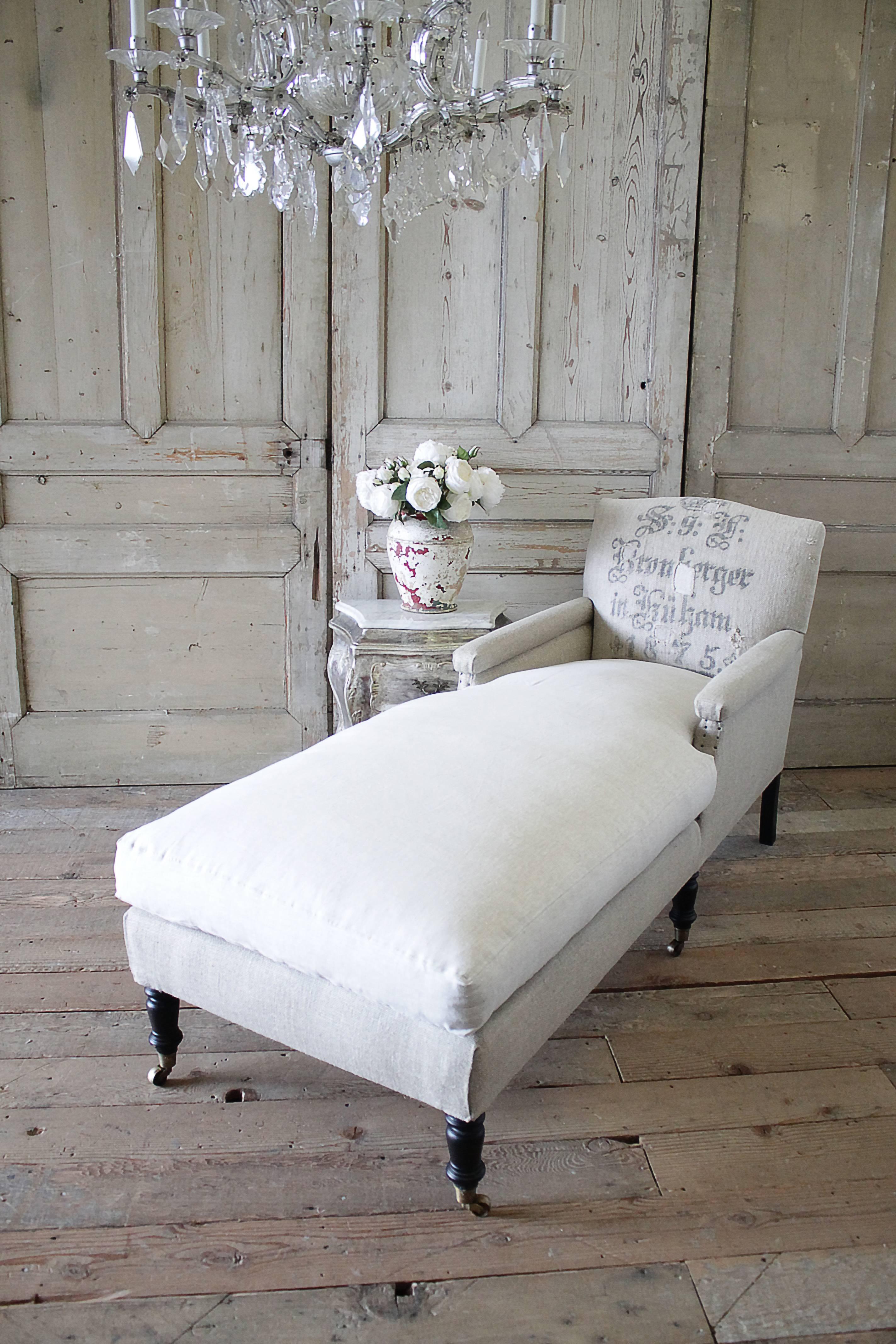 This beautiful high end chaise longue was custom-made with original antique German Grain Sack from 1875. Freshly laundered, and each patchwork design was carefully reinforced with an additional topstitch so we could keep this wonderful rustic