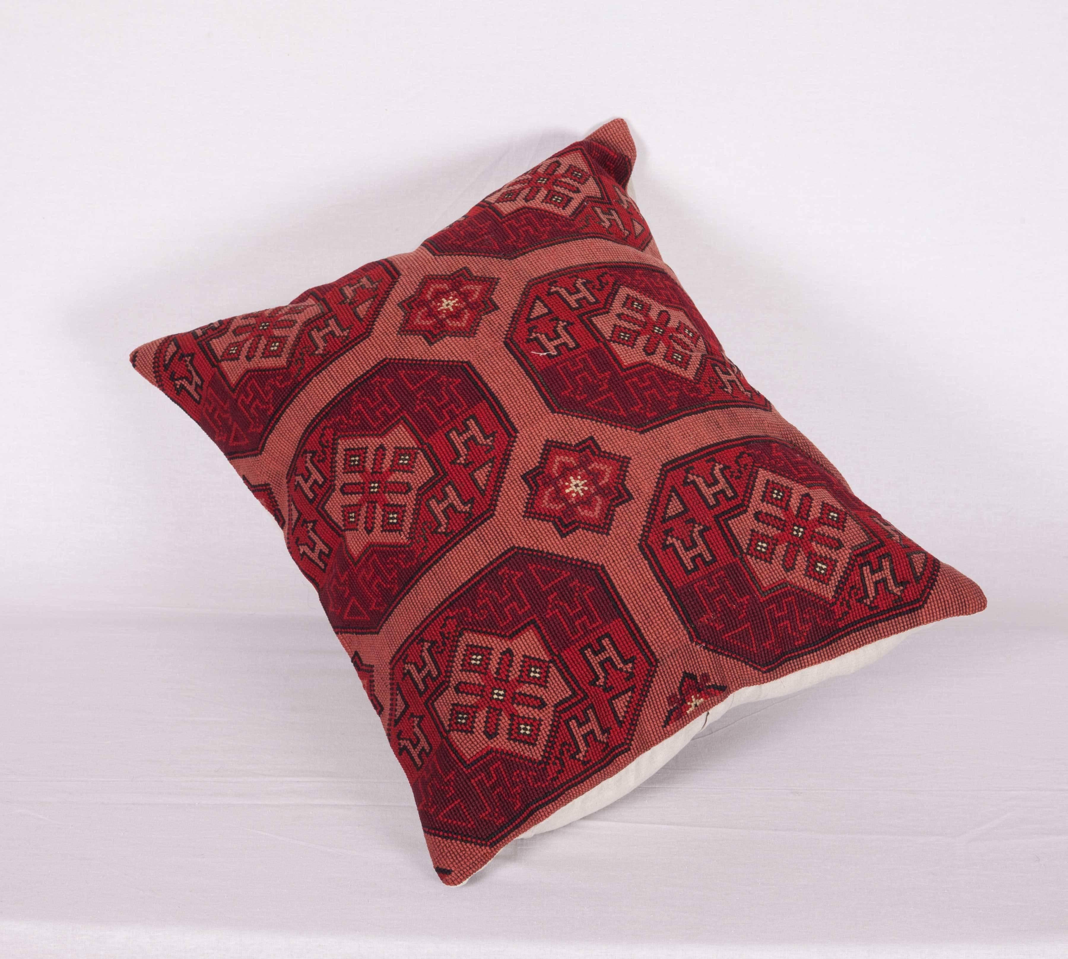 The pillow is made out of a early 20th century. Central Asian Embroidery done in cross stitch technique.
It does not come with an insert but it comes with a bag made to the size and out of cotton to accommodate the filling.
The backing is made of