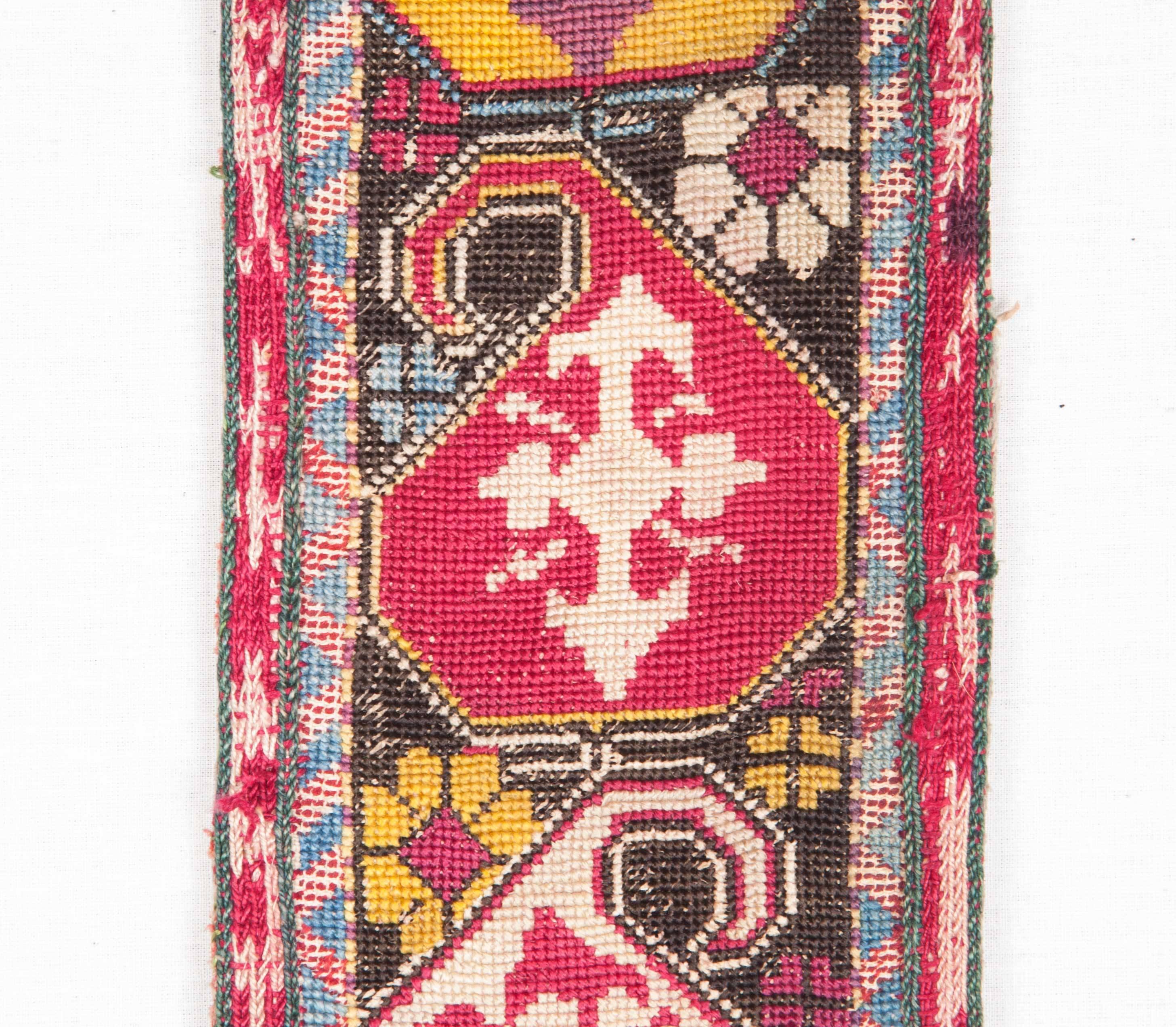 19th century antique Uzbek Lakai tribe silk belt in cross stitch embroidery technique. A great textile from Central Asia.