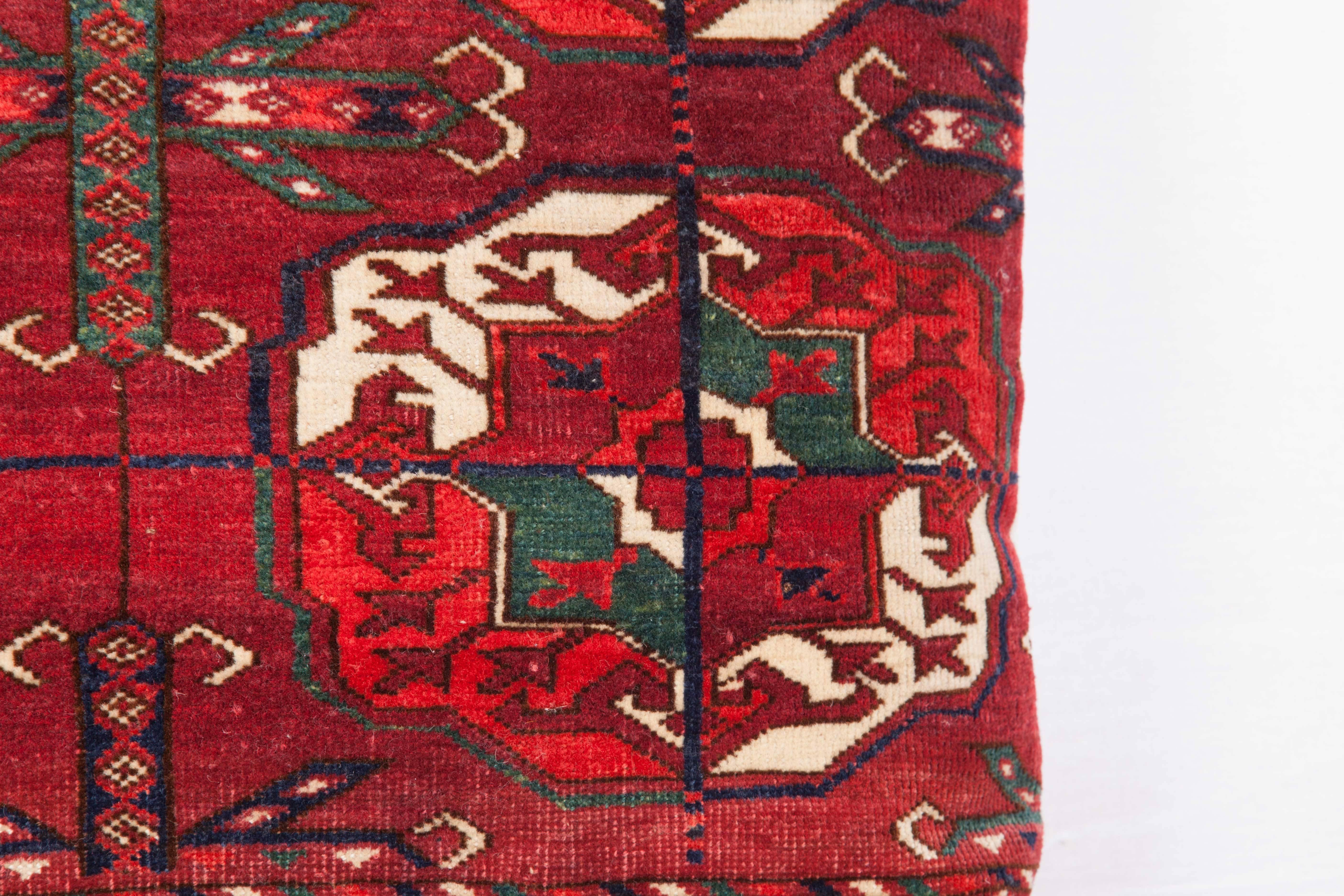 The pillow is made out of a early 19th century, Turkmen Tekke rug. It does not come with an insert but it comes with a bag made to the size and out of cotton to accommodate the filling. The backing is made of linen. Please note filling is not