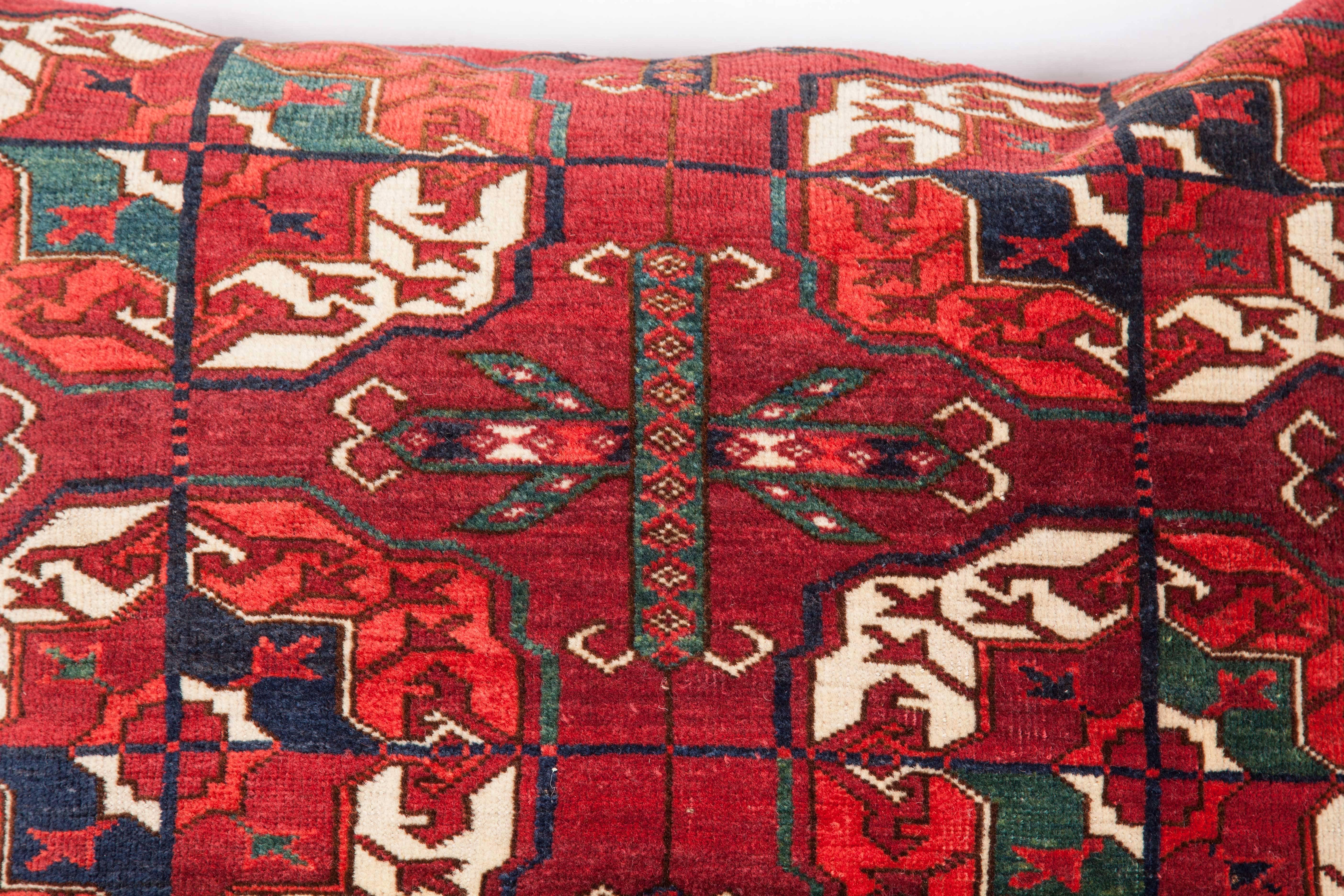Tribal Antique Pillow with Velvet like Texture Made Out of a Turkmen Rug