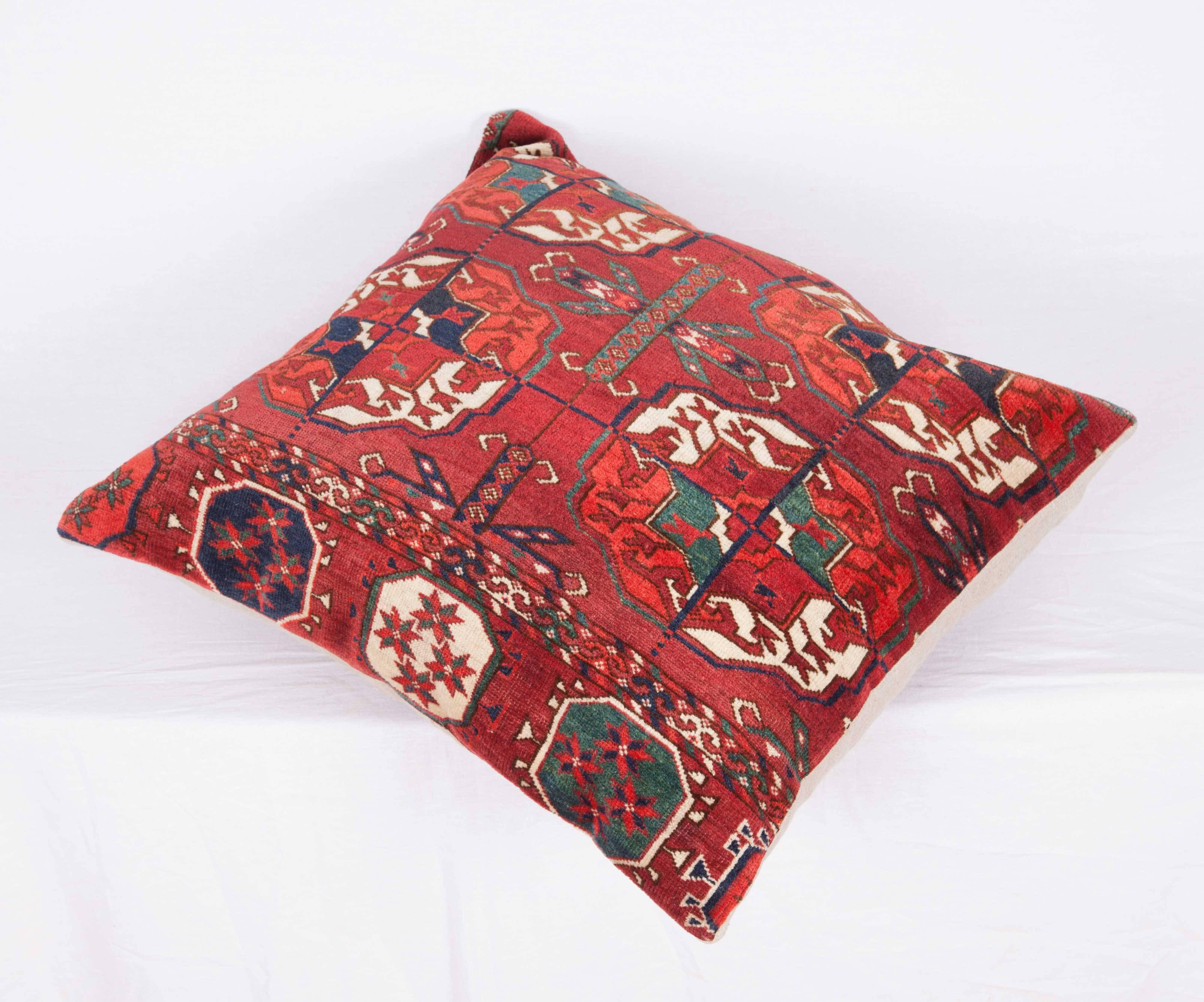 Antique Pillow with Velvet like Texture Made Out of a Turkmen Rug 1