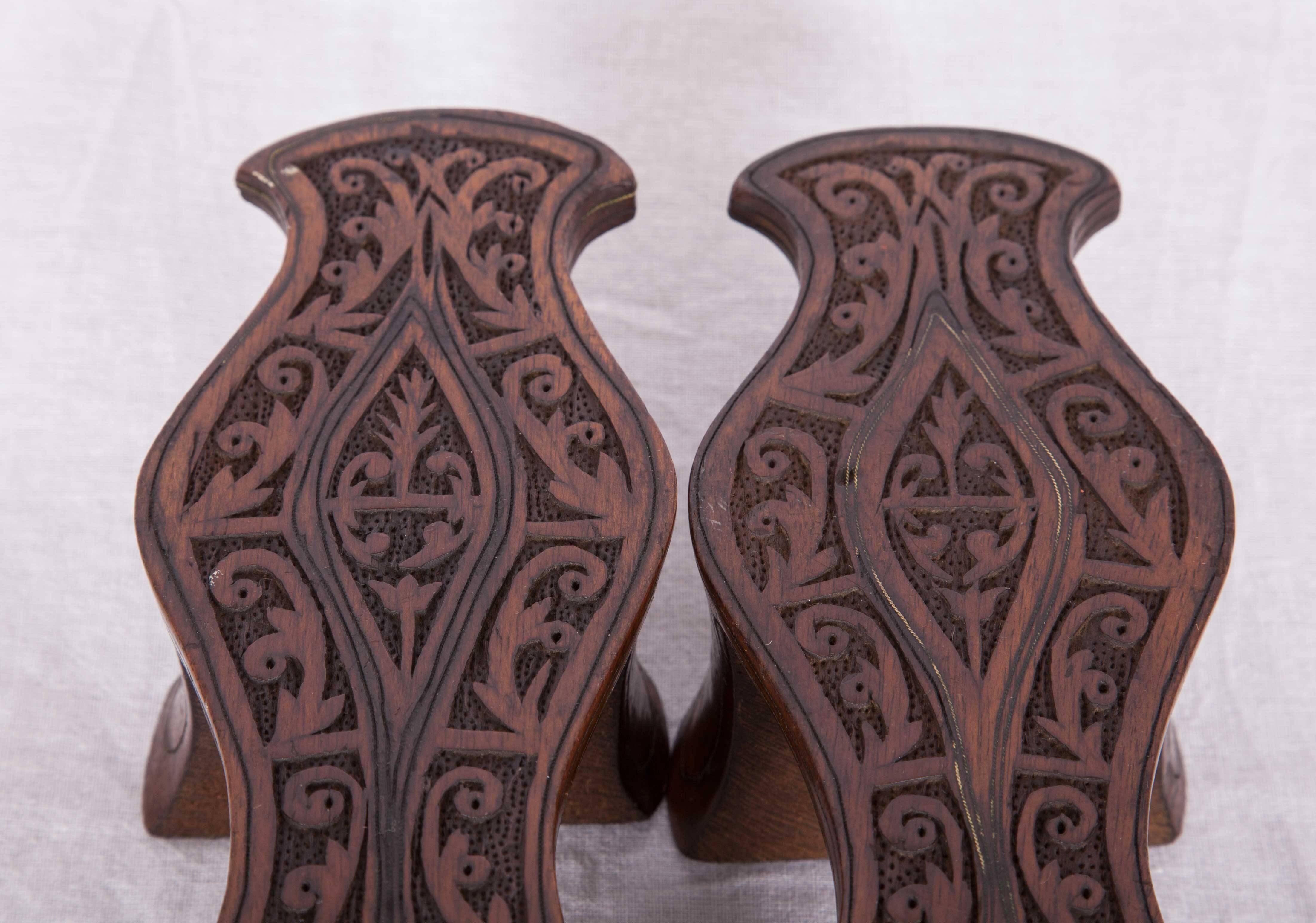 In very good shape. Carved out of wood and decorated, a lovely example to late 19th-early 20th century nalins.