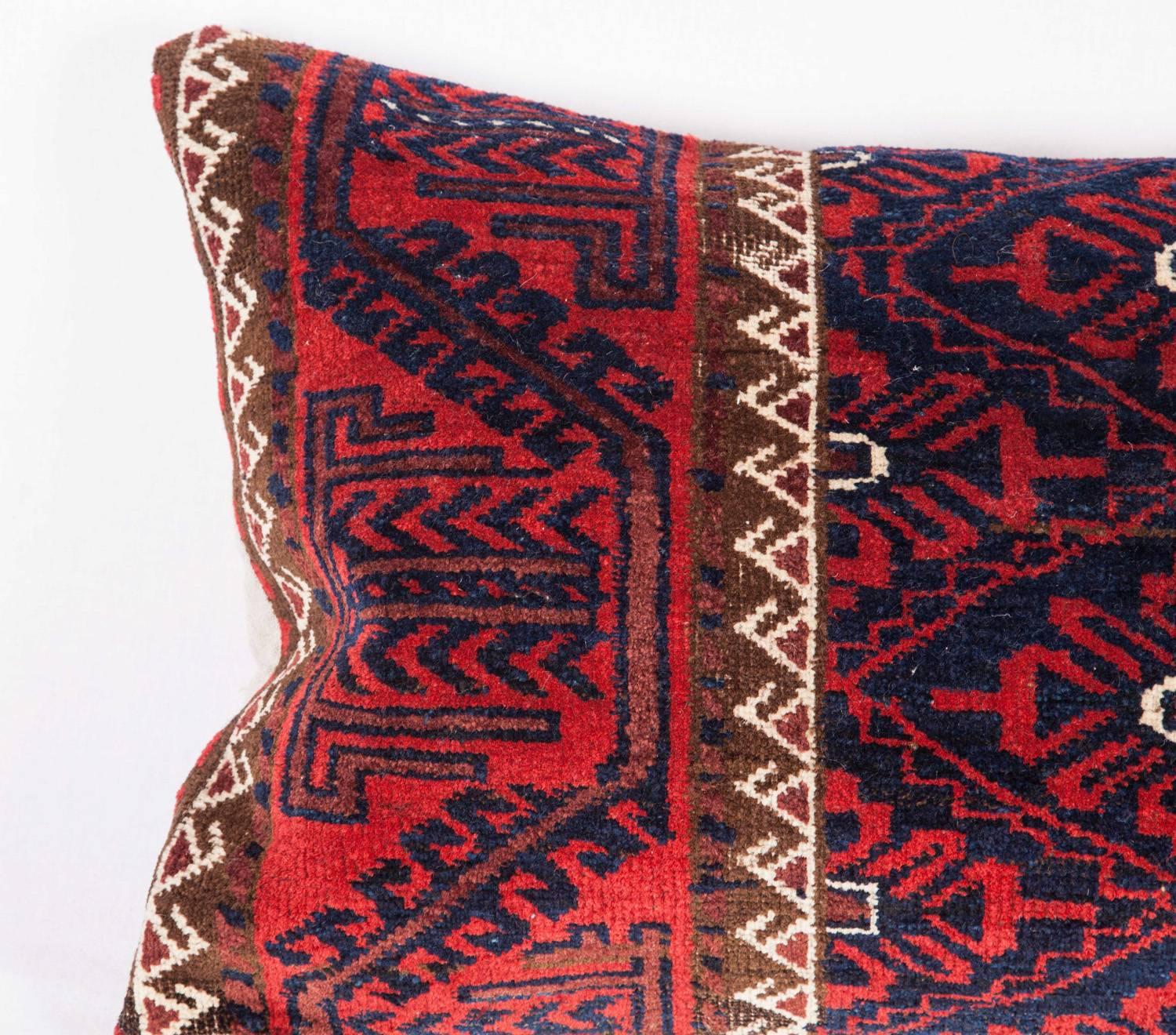 Tribal Antique Pillow Made Out of a 19th Century Baluch Rug Fragment